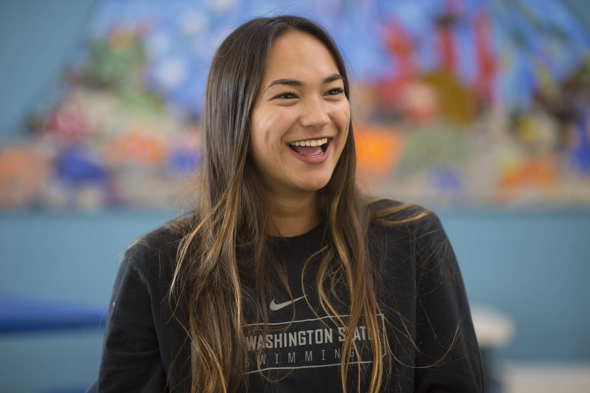 Ciera Kelly, a Juneau-Douglas High School graduate, talks Friday about her swimming career at Washington State University where she will return as a senior in the fall. (Michael Penn | Juneau Empire)