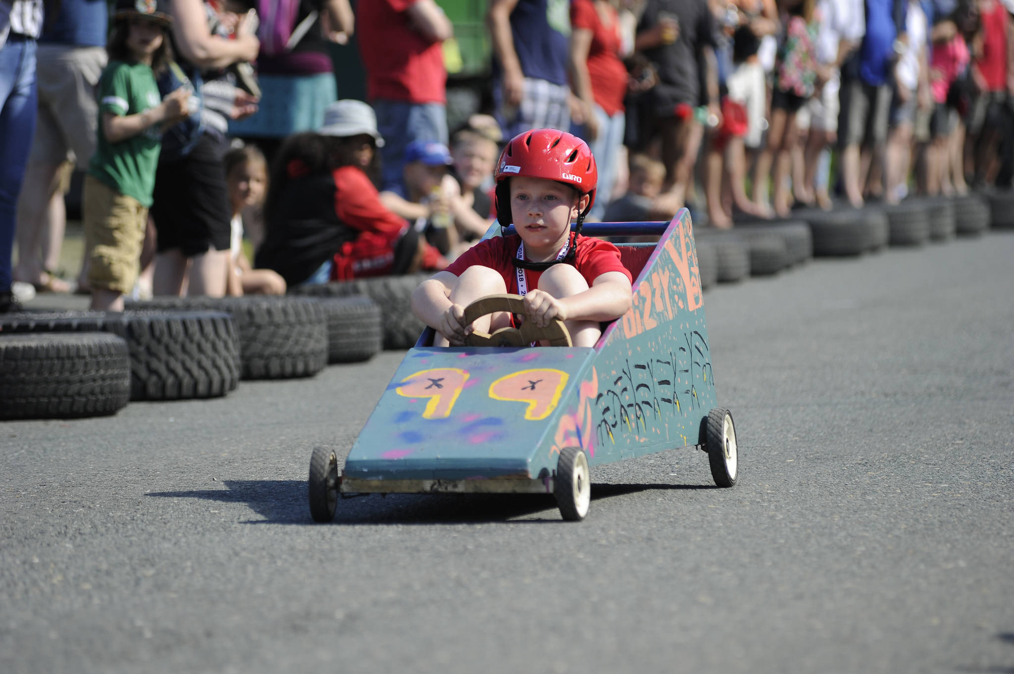 Aaron Hull, 9, races in the Soapbox Challenge down St. Ann&rsquo;s Avenue on Wednesday. (Nolin Ainsworth | Juneau Empire)