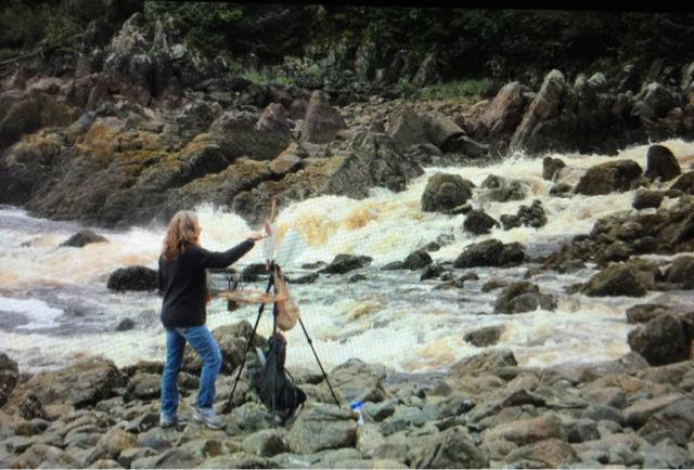 2015 artist-in-residence, Nancy Angelini-Crawford, painting along the shore below the Peterson Creek Salt Chuck. (Courtesy photo)
