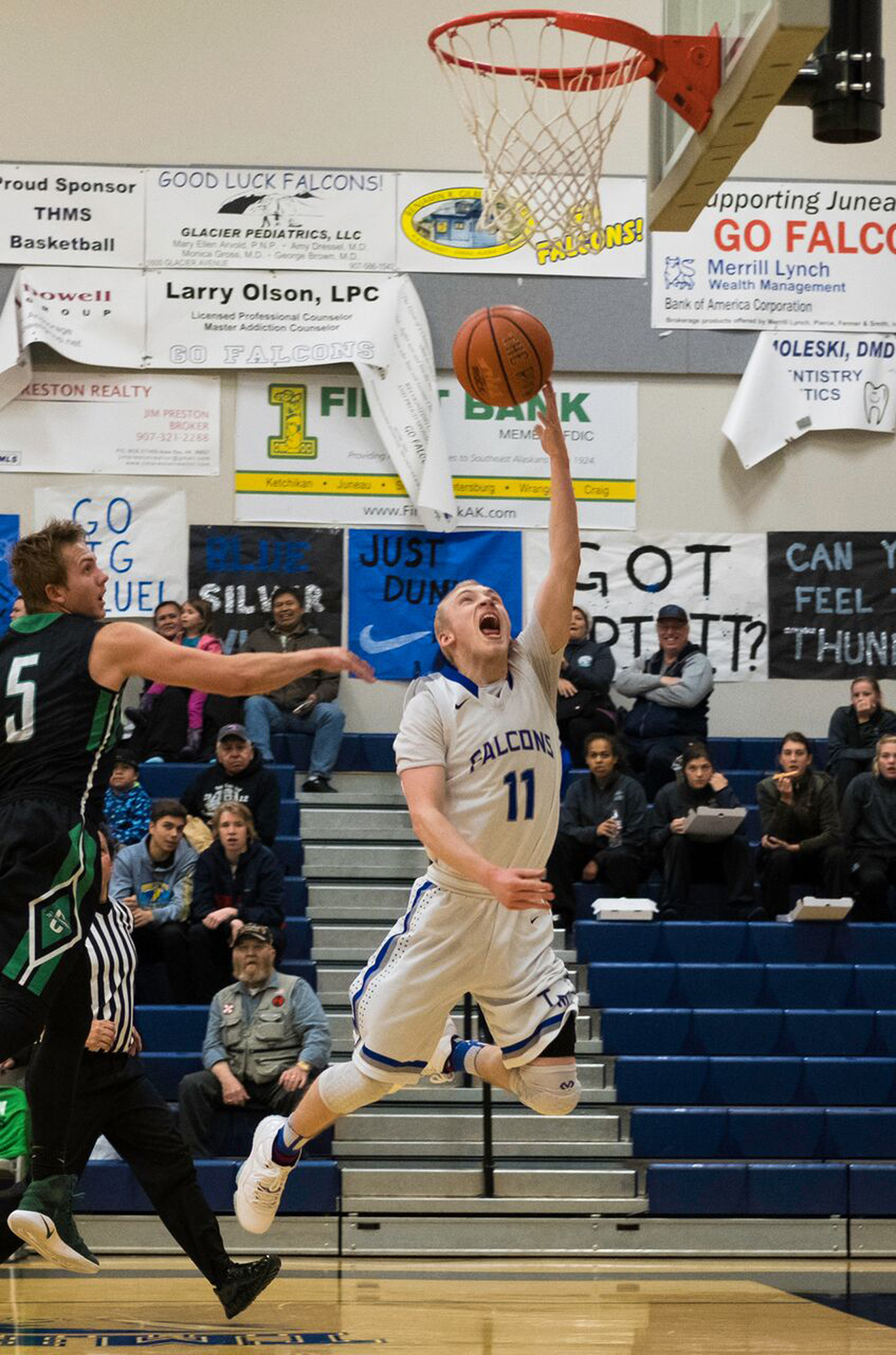 Thunder Mountain High School&rsquo;s Chase Saviers attempts a layup at Friday&rsquo;s home basketball game against the Colony Knights. (Lance Nesbitt | For the Juneau Empire)