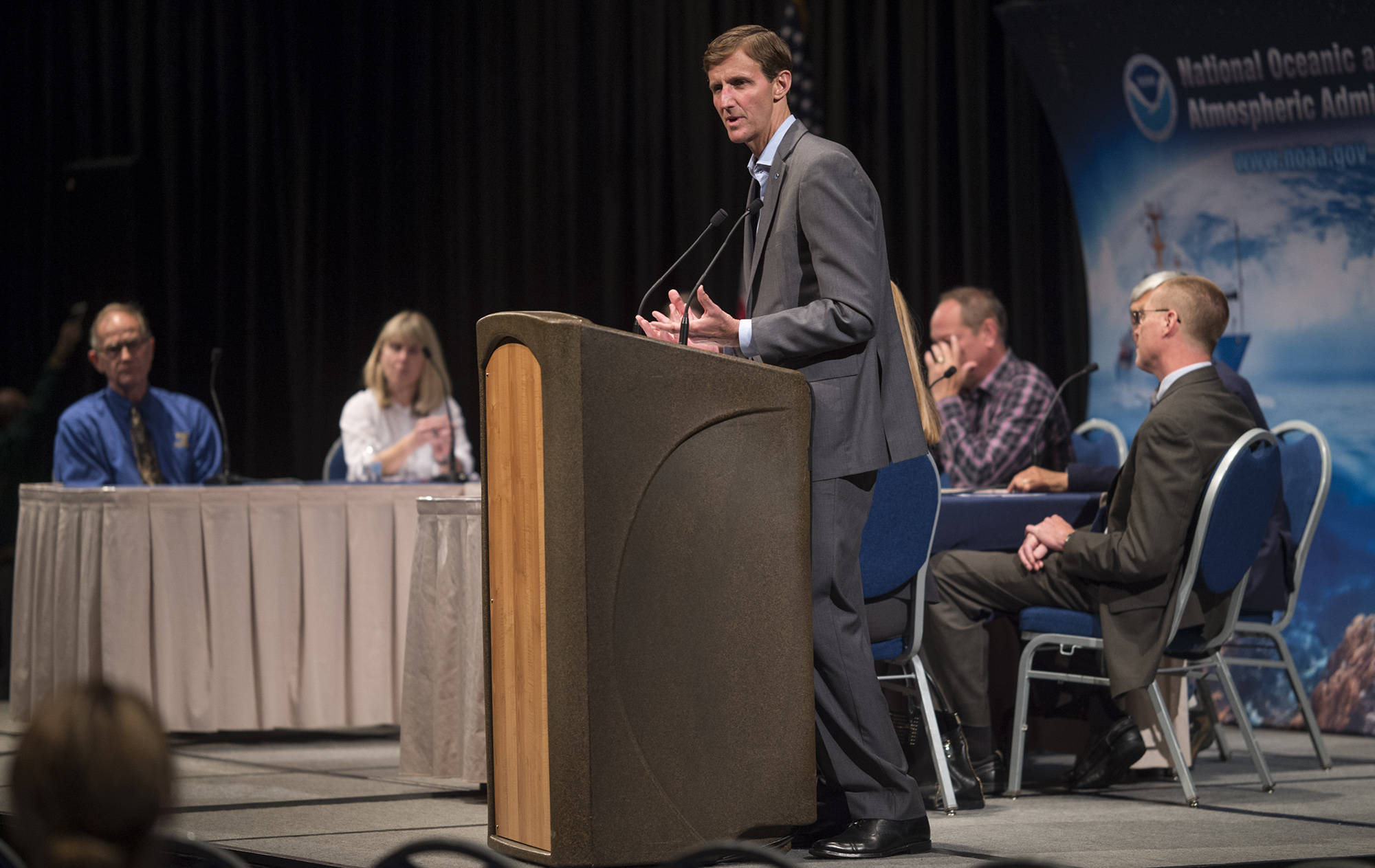 Timothy Cole Gallaudet, retired Rear Admiral in the United States Navy currently serving as the Assistant Secretary of Commerce for Oceans and Atmosphere within the U.S. Department of Commerce, speaks before a town hall event sponsored by NOAA at Centennial Hall on Friday, Aug. 31, 2018. (Michael Penn | Juneau Empire)