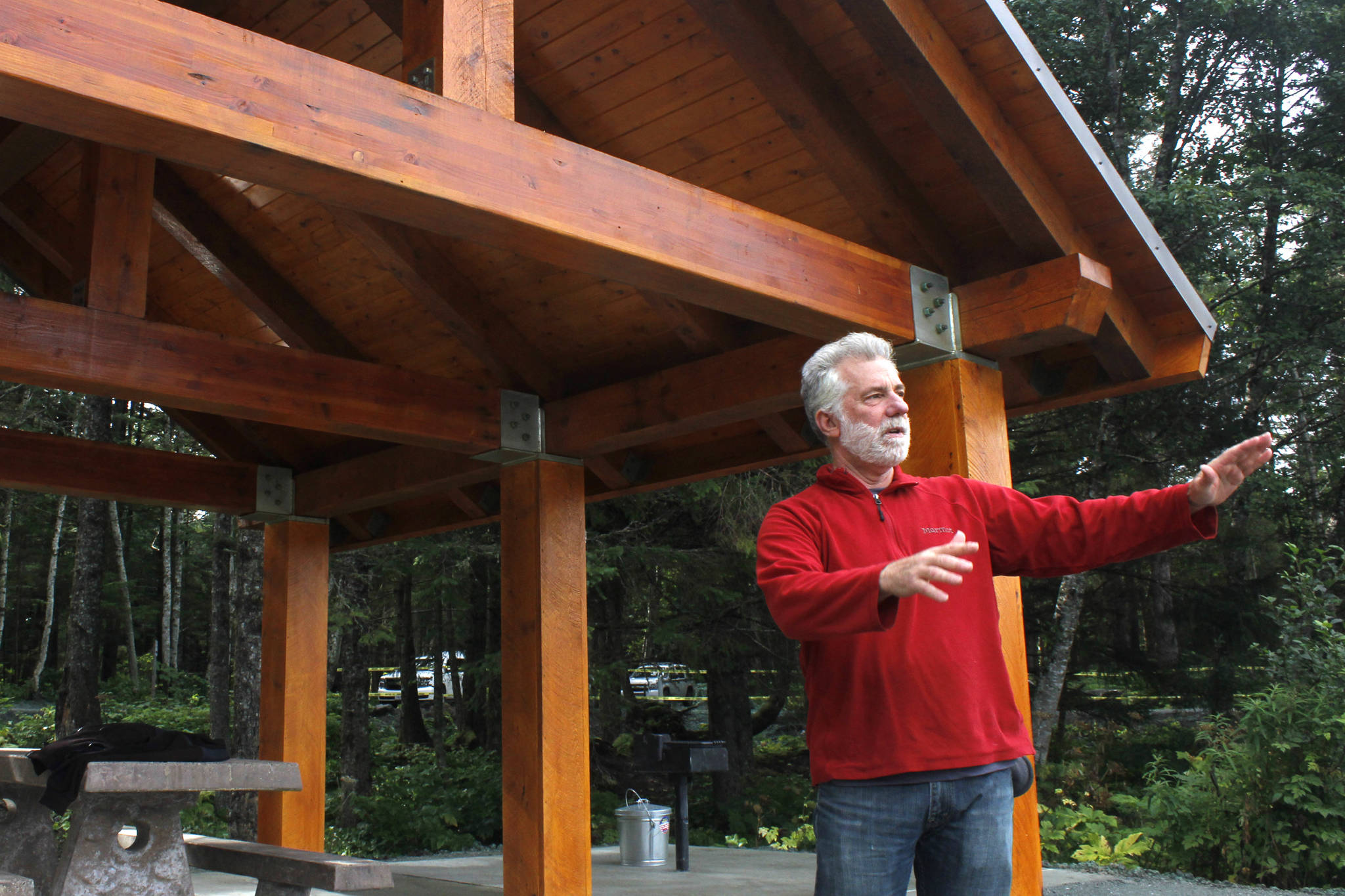 Marc Ramonda, development recreation manager for the Juneau Ranger District, speaks about renovations at Lena Beach Recreation Area on Saturday, Sept. 1, 2018. The area opened this weekend after two new shelters were installed, among other improvements. (Alex McCarthy | Juneau Empire)