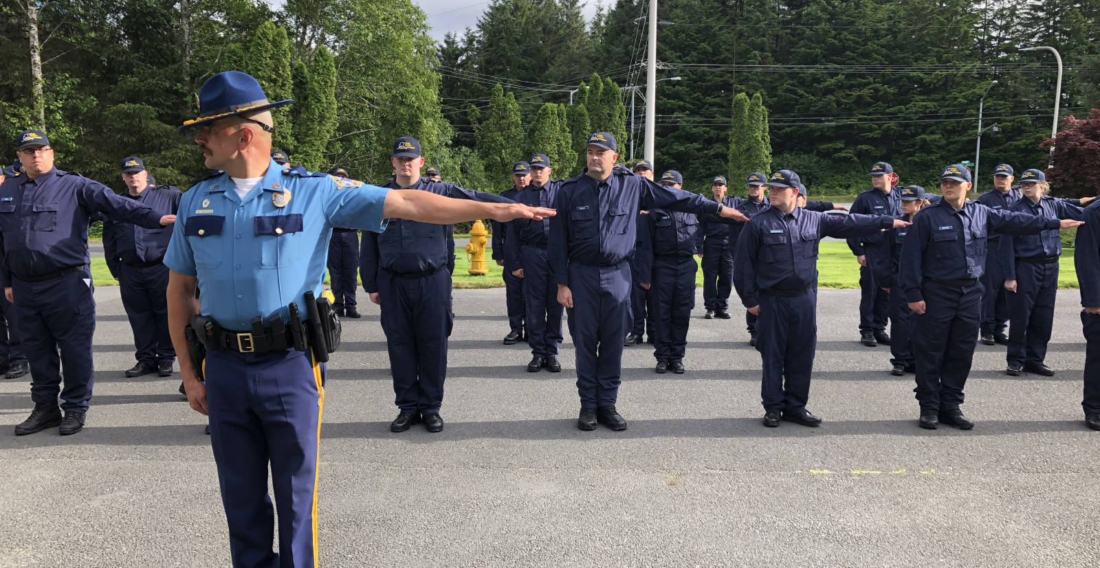 Sgt. Eric Spitzer, deputy commander of the Alaska Law Enforcement Training Academy, leads recruits in training exercises on July 30, 2018, the first day of training at the Public Safety Training Academy in Sitka, Alaska. (Alaska State Troopers photo)