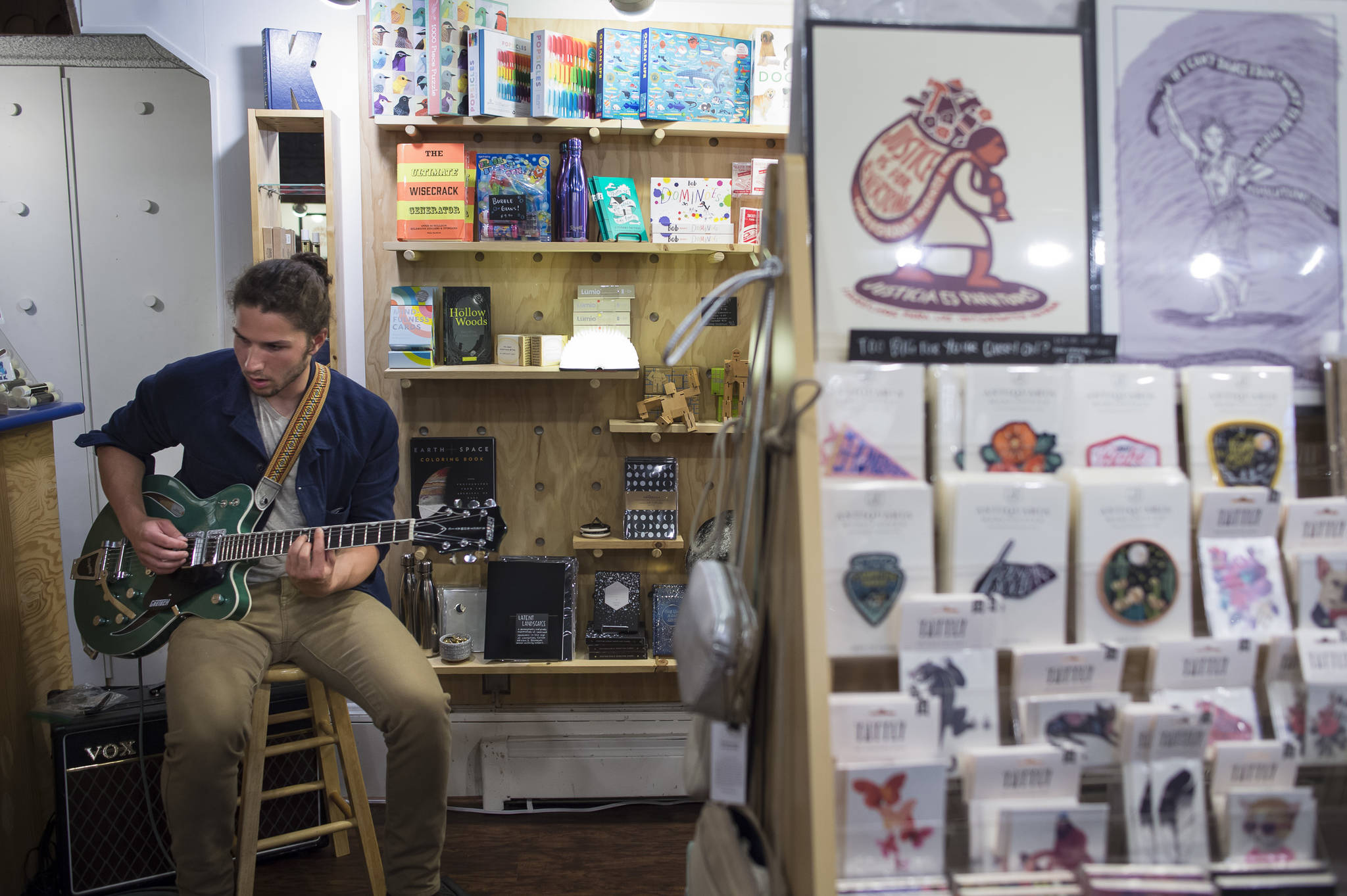 Avery Stewart provides live music at Kindred Post during First Friday on Friday, Sept. 7, 2018. (Michael Penn | Juneau Empire)