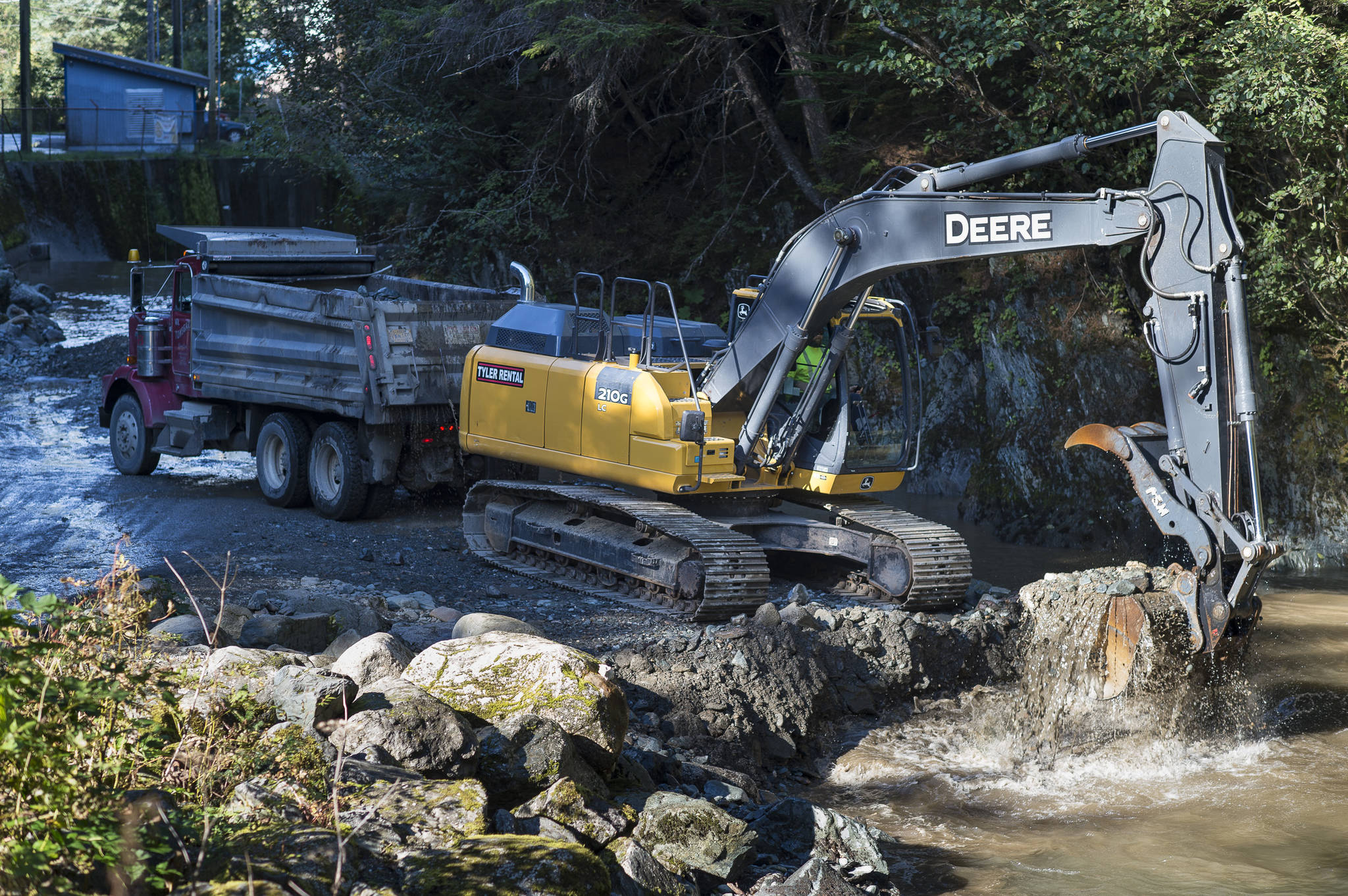 An excavator dredges Gold Creek at Cope Park on Wednesday, Sept. 12, 2018. (Michael Penn | Juneau Empire)