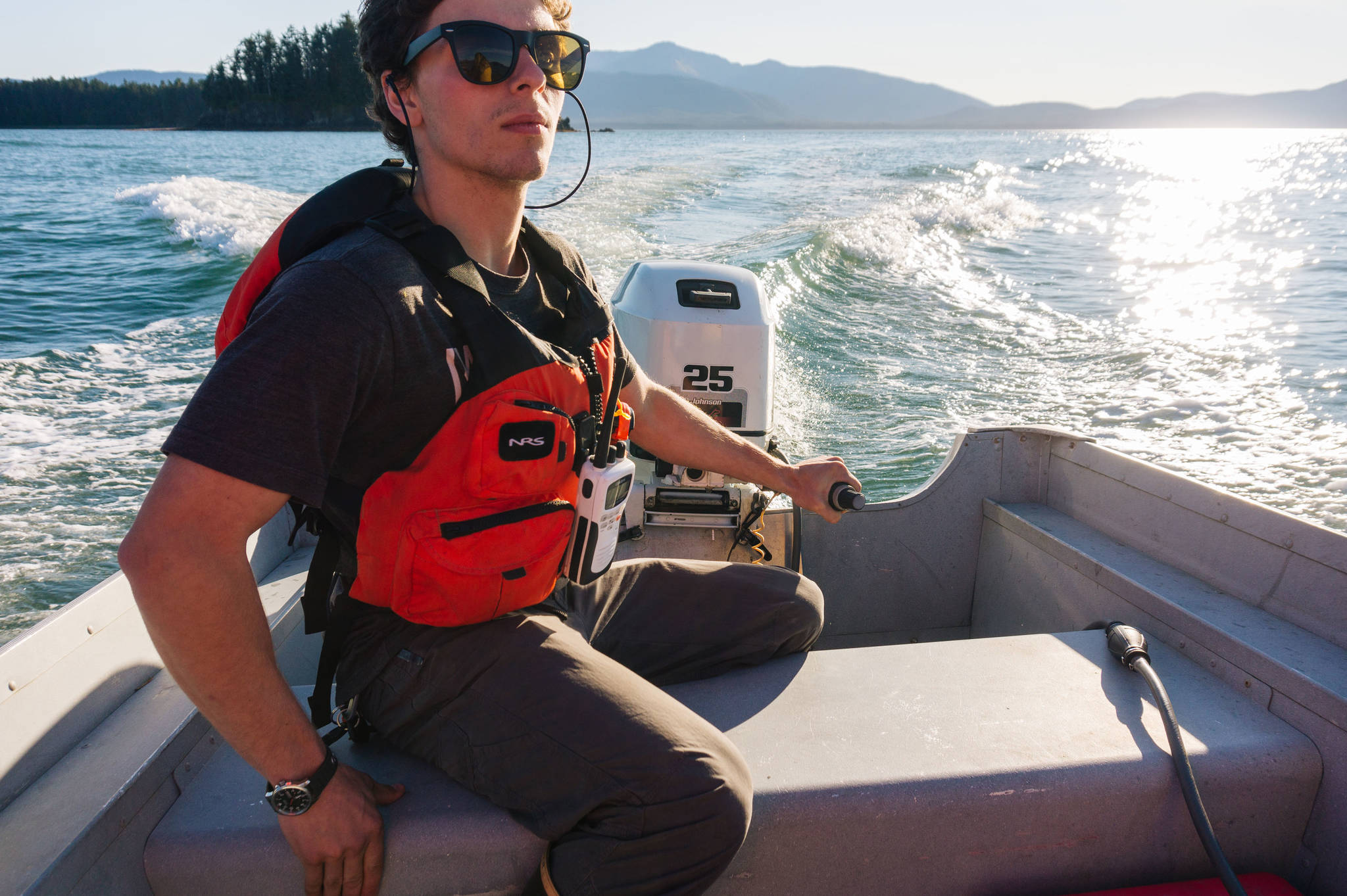 Caption Keagan Walker steering the boat to Fritz Cove. (Gabe Donohoe | For Juneau Empire)