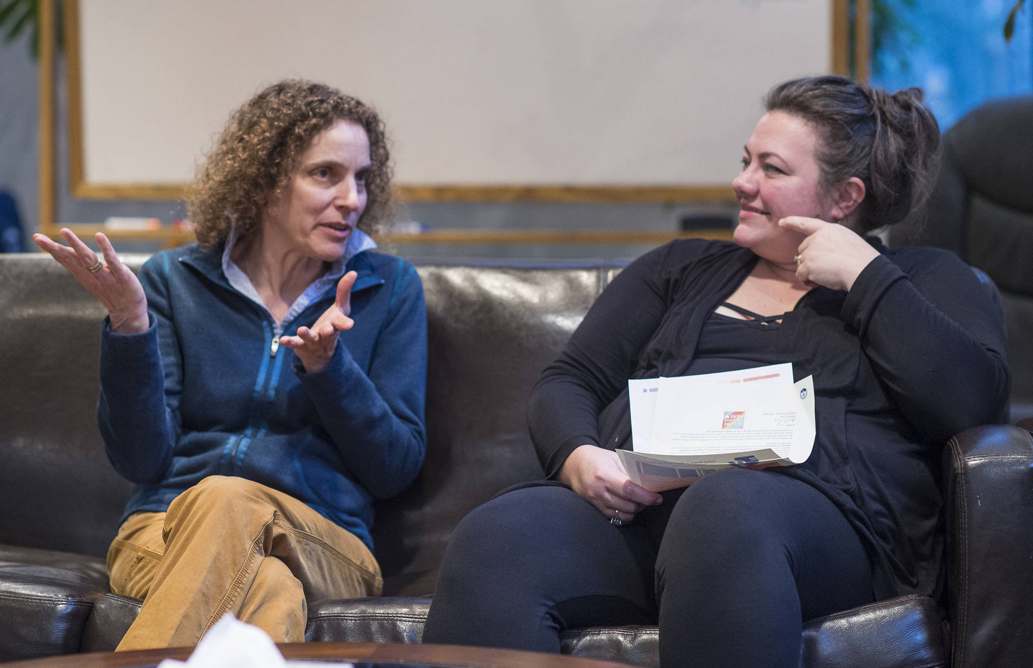 AWARE Executive Director Saralynn Tabachnick, left, and Deputy Director Mandy O’Neal Cole talk about the shelter becoming gender inclusive during an interview on Monday, Dec. 11, 2017. (Michael Penn | Juneau Empire File)
