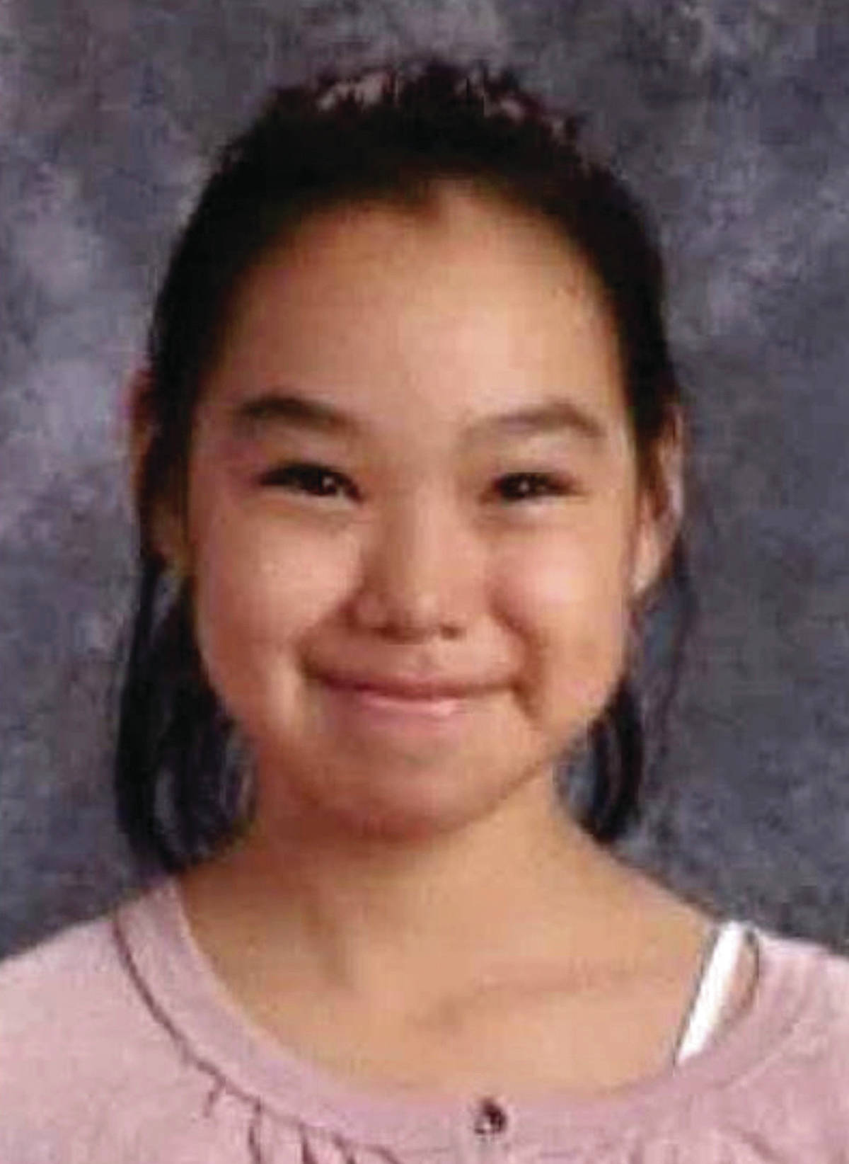 This undated file photo that is part of a missing person poster released by Alaska State Troopers shows Ashley Johnson-Barr. The 10-year-old girl was found dead Friday, Sept. 14, 2018 more than a week after she was reported missing in Kotzebue. Federal charges were filed Monday against Peter Wilson, 41, in connection to the death of Johnson-Barr. (Alaska State Troopers via AP, File)