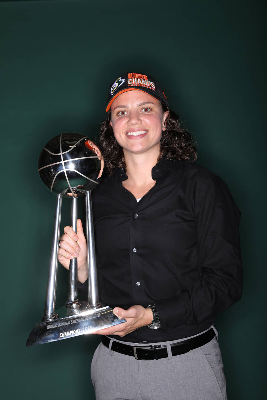 Talisa Rhea with the WNBA championship trophy last Wednesday. (Courtesy Photo | Ned Dishman/NBAE)