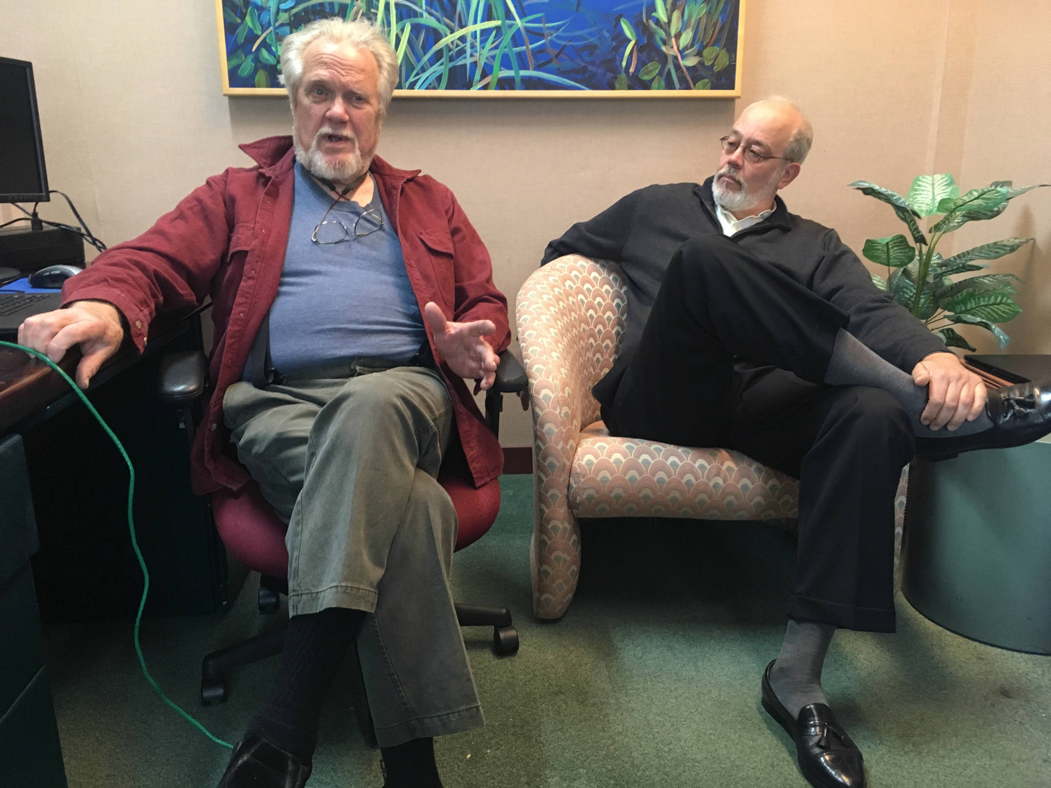 Eric Forrer, left, and Joe Geldhof, right, have sued the State of Alaska in an attempt to stop a plan that calls for borrowing up to $1 billion from global bond markets to pay oil and gas tax credits owed by the state. They are pictured May 22, 2018 in an interview at the Juneau Empire. (James Brooks | Juneau Empire)