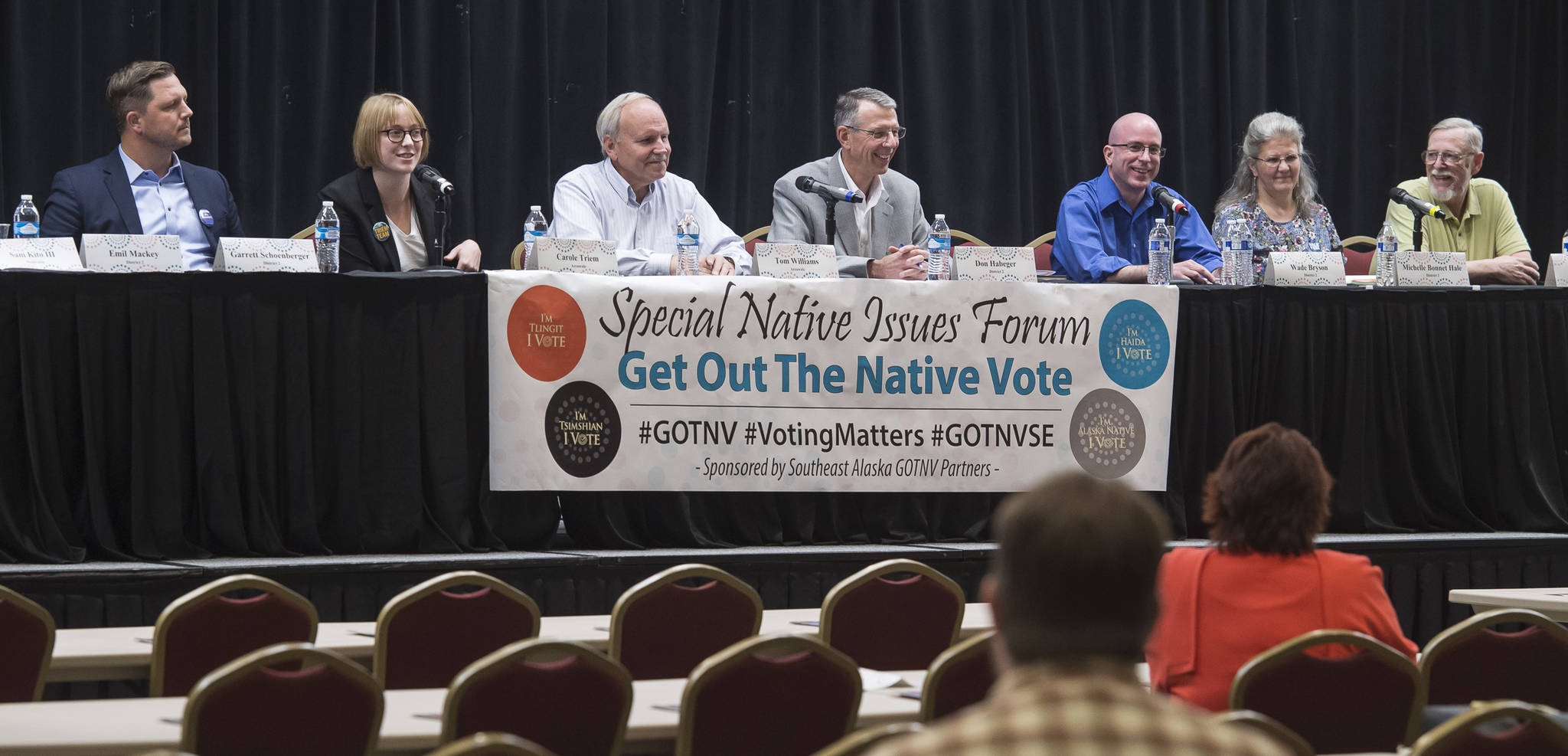 Assembly candidates answers questions during a Special Native Issues Forum at the Elizabeth Peratrovich Hall on Tuesday, Sept. 18, 2018. From left: Garrett Schoenberger, Carole Triem, Tom Williams, Don Habeger, Wade Bryson, Michelle Bonnet Hale and Loren Jones. (Michael Penn | Juneau Empire)