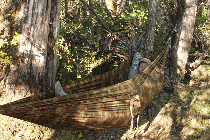 The author relaxes before packing up camp and heading home after a deer hunt. (Jeff Lund | For the Juneau Empire)