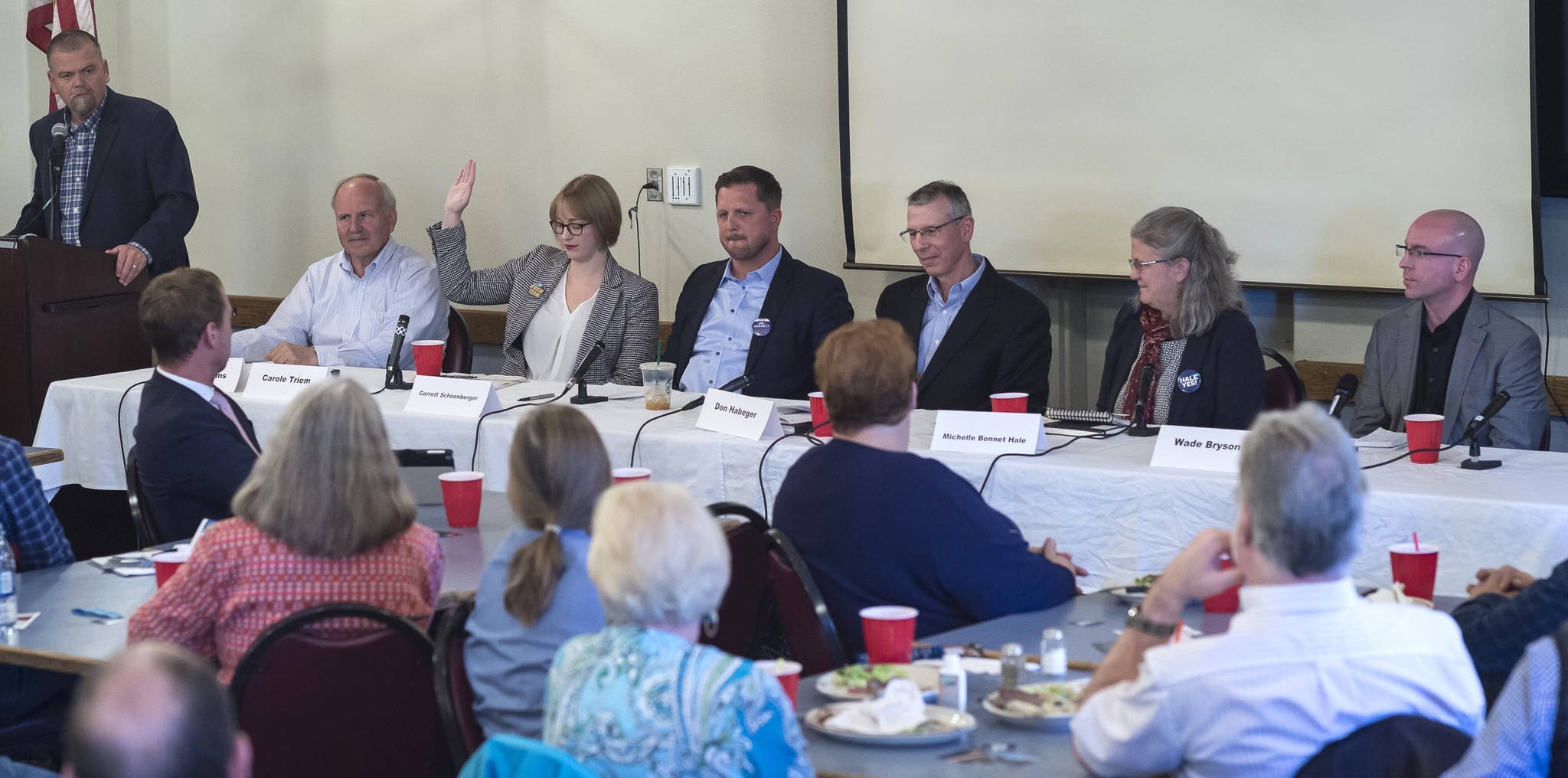 Juneau Assembly candidates for the Areawide and District 2 seats are asked to raise their hand if they support Ballot Measure 1, Stand for Salmon, during a forum at the Juneau Chamber of Commerce during its weekly luncheon at the Moose Lodge on Thursday, Sept. 20, 2018. District 2 candidate Emil Mackey did not attend the event because of work travel. (Michael Penn | Juneau Empire)