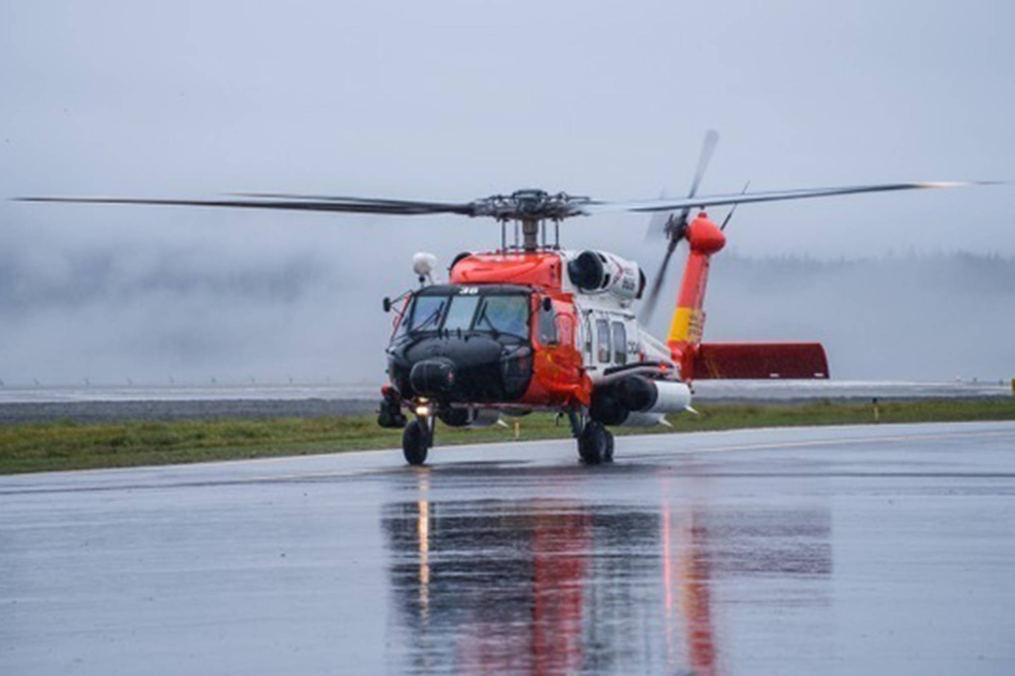 A Coast Guard Air Station Sitka MH-60 Jayhawk helicopter aircrew medevacs a patient from Wrangell to Sitka, Alaska, July 17, 2018. (Courtesy photo | Stephen Prysunka)