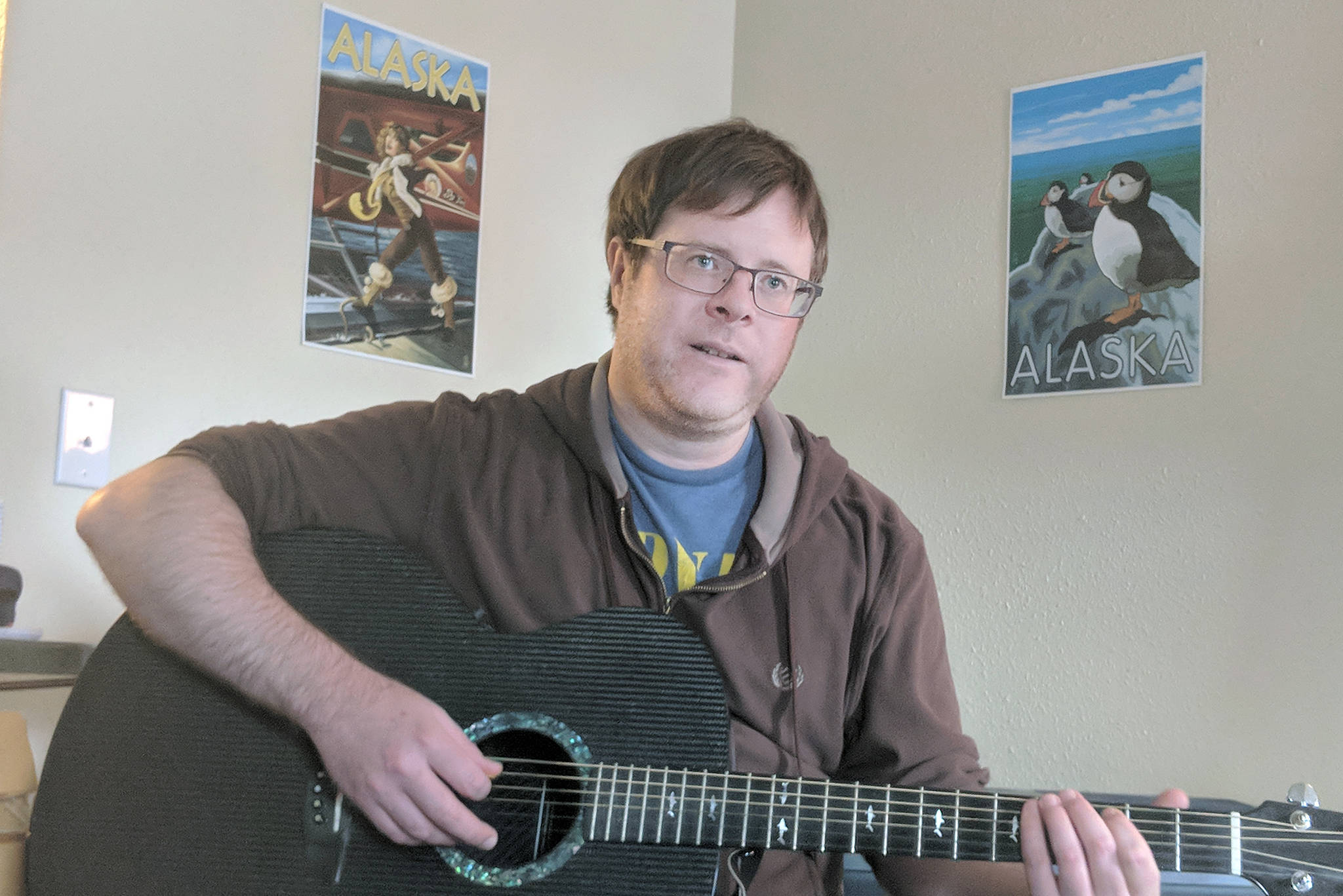 Andy Miller, a Juneau musician, released an album of 28 songs about Alaska titled, “Alaska in 28 Songs.” The project started with a goal of writing 49 songs for the 49th state, but Miller fatigue set in, and he released the project as a a pay-what-you-want Bandcamp album. (Ben Hohenstatt | Capital City Weekly)
