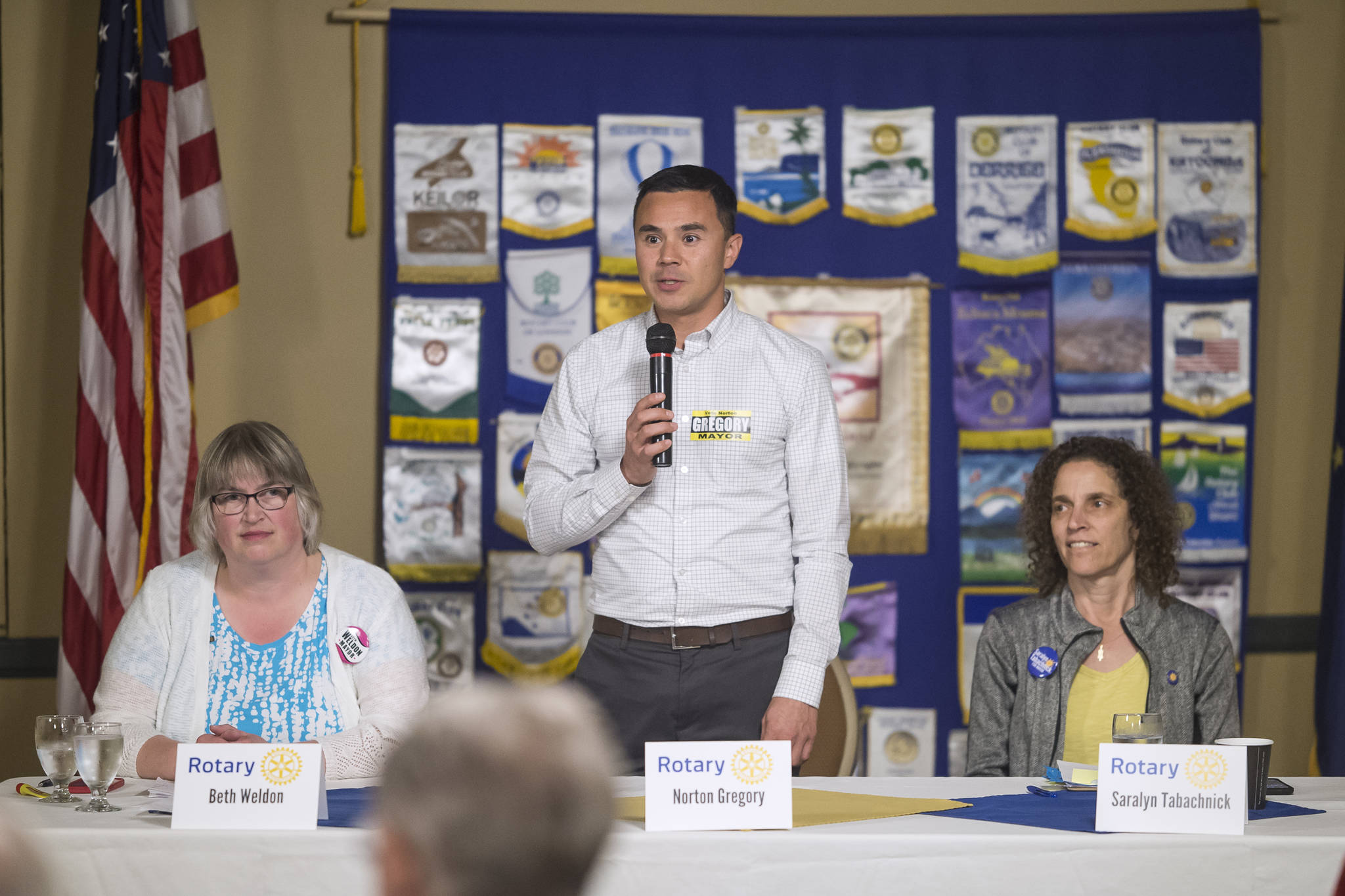 Juneau mayoral candidates Beth Weldon, left, Norton Gregory, center, and Saralyn Tabachnick introduce themselves to the Rotary Club of Juneau during their luncheon at the Baranof Hotel on Tuesday, Sept. 25, 2018. (Michael Penn | Juneau Empire)