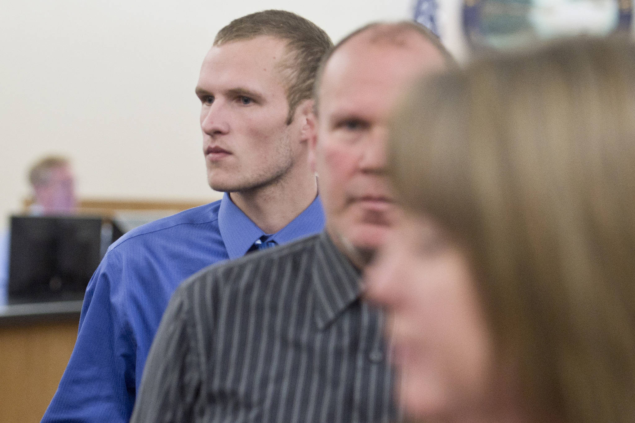 Ty Alexander Grussendorf, 22 at the time, follows his parents out of Juneau Superior Court after a trial date-setting hearing on Wednesday, March 1, 2017. (Michael Penn | Juneau Empire File)