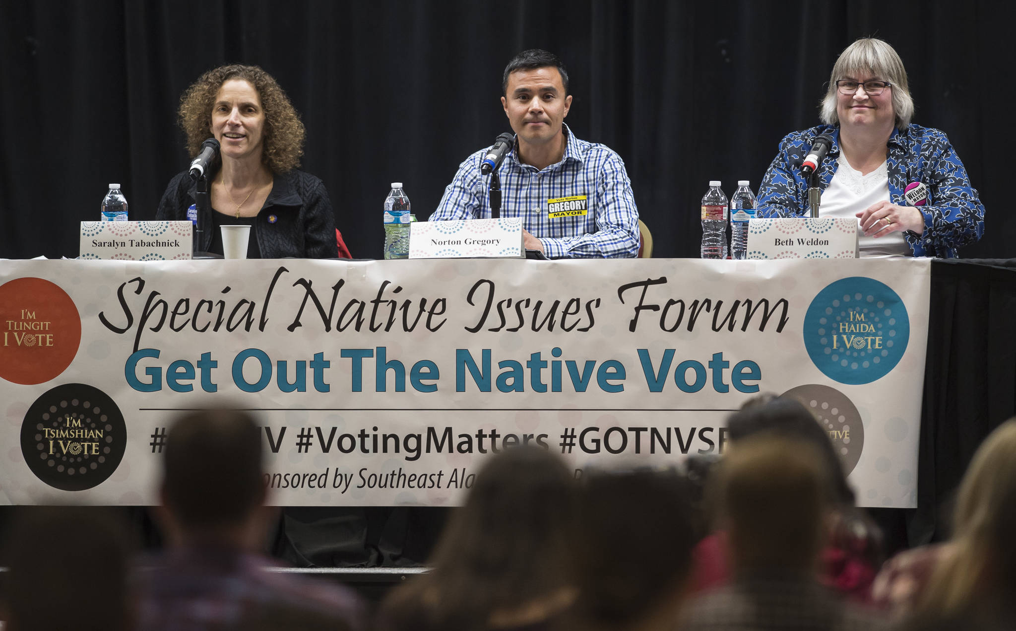 Mayoral candidates Saralyn Tabachnick, left, Norton Gregory, center, and Beth Weldon answer questions during a Special Native Issues Forum at the Elizabeth Peratrovich Hall on Tuesday, Sept. 18, 2018. (Michael Penn | Juneau Empire)