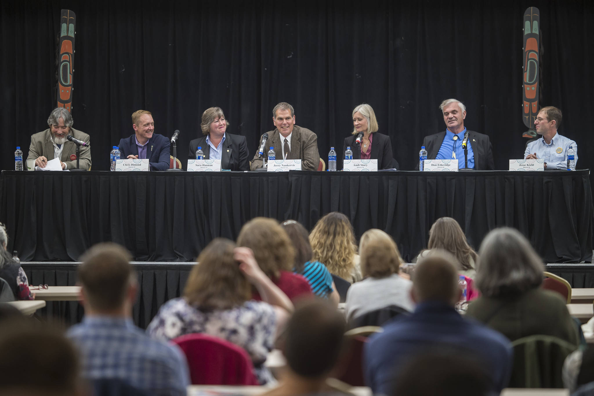 Legislative candidates answers questions during the Native Issues Forum at the Elizabeth Peratrovich Hall on Tuesday, Sept. 25, 2018. From left: Moderator Rep. Sam Kito III, D-Juneau, House District 33 candidates Chris Dimond and Sara Hannan, House District 34 candidates Jerry Nankervis and Andi Story, and Senate District Q candidates Don Etheridge and Jesse Kiehl. (Michael Penn | Juneau Empire)