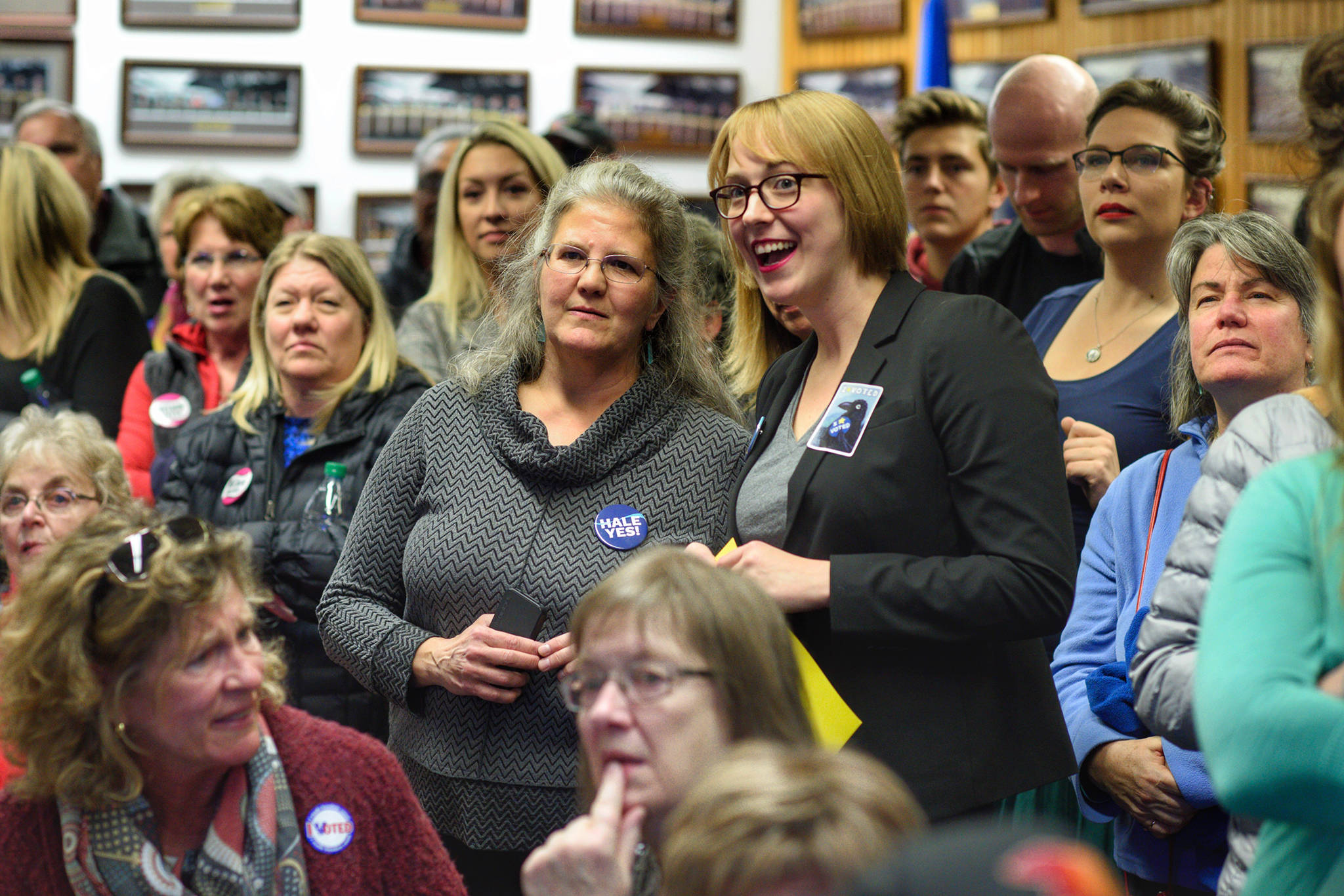 Michelle Bonnet Hale and Carole Triem on election night at Election Central at City Hall on Oct. 2, 2018. (Michael Penn | Juneau Empire)