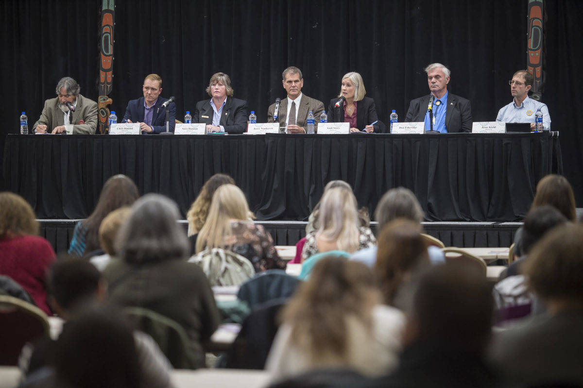 Legislative candidates answers questions during the Native Issues Forum at the Elizabeth Peratrovich Hall on Tuesday, Sept. 25, 2018. From left: Moderator Rep. Sam Kito III, D-Juneau, House District 33 candidates Chris Dimond and Sara Hannan, House District 34 candidates Jerry Nankervis and Andi Story, and Senate District Q candidates Don Etheridge and Jesse Kiehl. (Michael Penn | Juneau Empire)