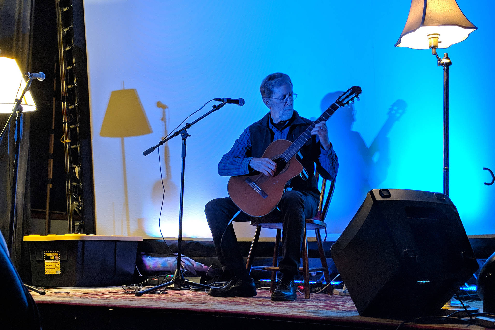 Dan Hopson was the first performer to take the stage for the Joy of Strings, which showcased various local guitarists and their unique approach to making music. Hopson played songs associated with movies on a nylon-stringed classical guitar. (Ben Hohenstatt | Capital City Weekly)