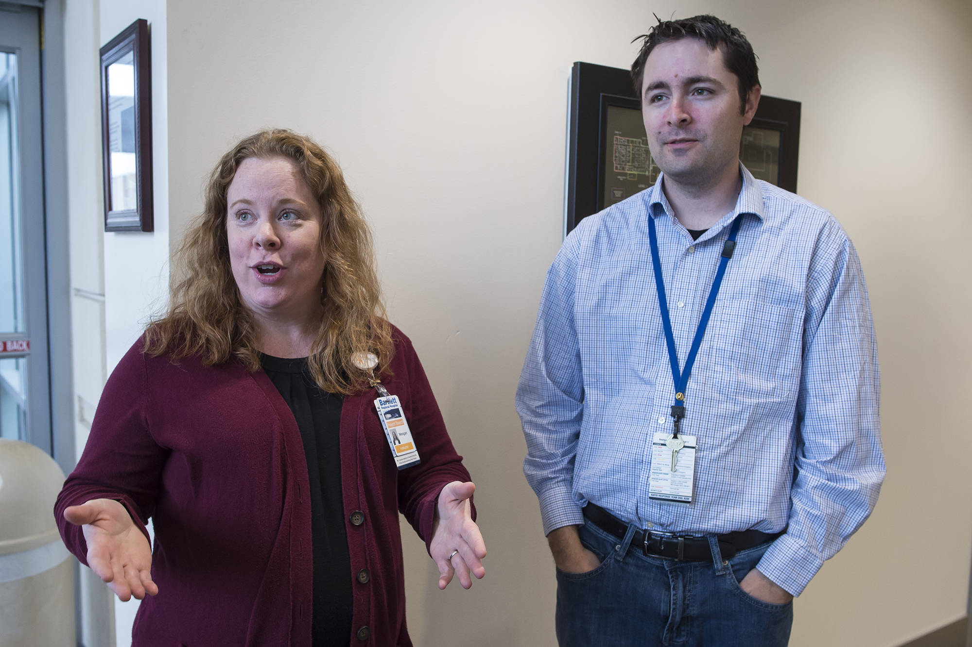 Meagan Hinton, left, an instructor of Project SEARCH, and Jason Bushman, HR specialist, talk about Bartlett Regional Hospital’s internship for young people with disabilities on Friday, Oct. 5, 2018. (Michael Penn | Juneau Empire)