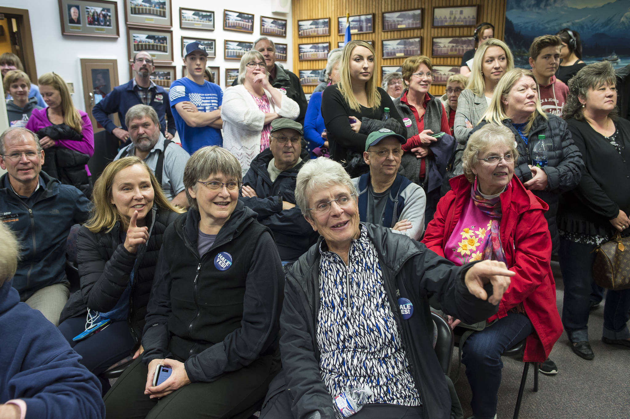 Juneau residents pack into the Assembly chambers to watch election results on Tuesday, Oct. 2, 2018. (Michael Penn | Juneau Empire)