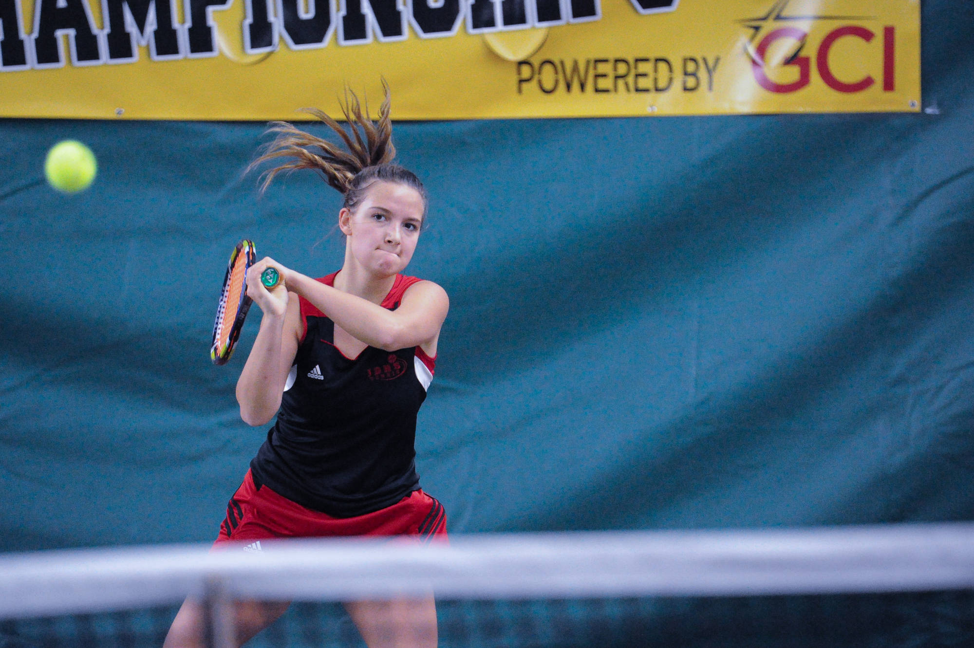 Erica Hurtte makes a return against South Anchorage’s Christine Hemry in the singles state championship game of the ASAA/First National Bank Alaska State Tennis Championships at the Alaska Club East in Anchorage on Saturday, Oct. 6, 2018. Hurtte lost 6-1, 6-1. (Michael Dinneen | For the Juneau Empire)
