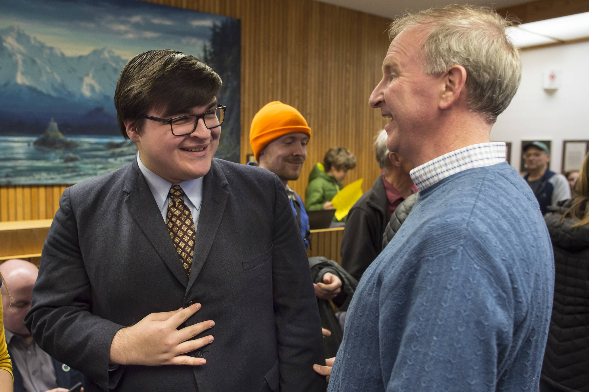 School Board candidate Kevin Allen, left, is congratulated by School Board President Brian Holst during Election night in the Assembly chambers on Tuesday, Oct. 2, 2018. (Michael Penn | Juneau Empire)