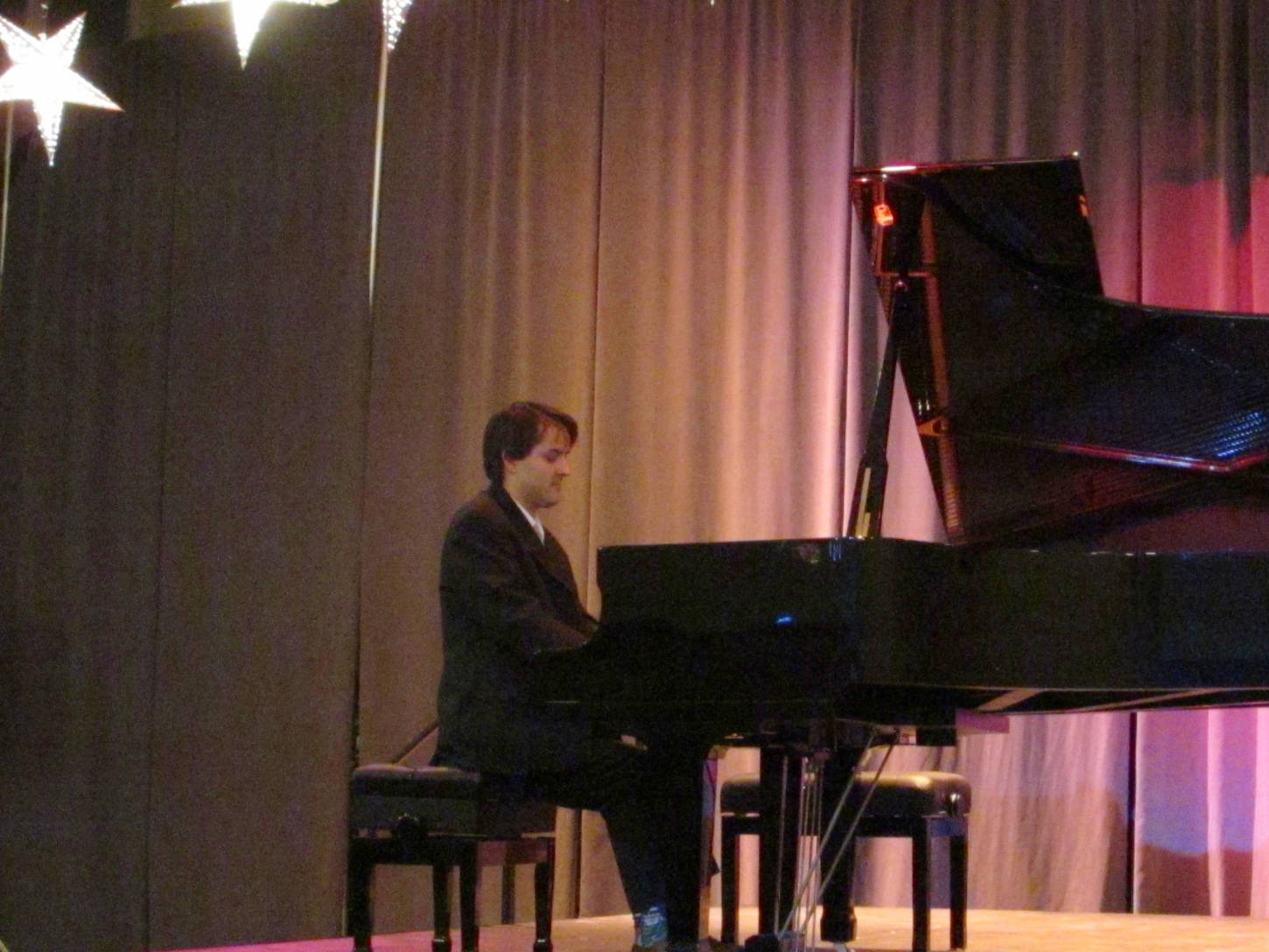 Jon Hays performs during the first recital in the Juneau Piano Series, which Hays organized. Hays said the project was devised as a showcase for piano music and the Juneau Arts & Culture Center’s piano, which was purchased last year.(Ben Hohenstatt | Capital City Weekly)