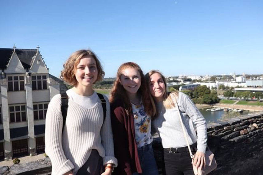 Nadine from Finland (left), Bridget (center) and Ruby from New Zealand (right), exploring a castle in downtown Angers, France. (Bridget McTague | For the Juneau Empire)