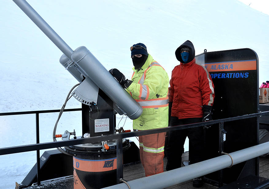 Alaska Department of Transportation and Public Facilities workers use the Avalauncher gun in early 2016. (Hal Hartman | Courtesy photo)