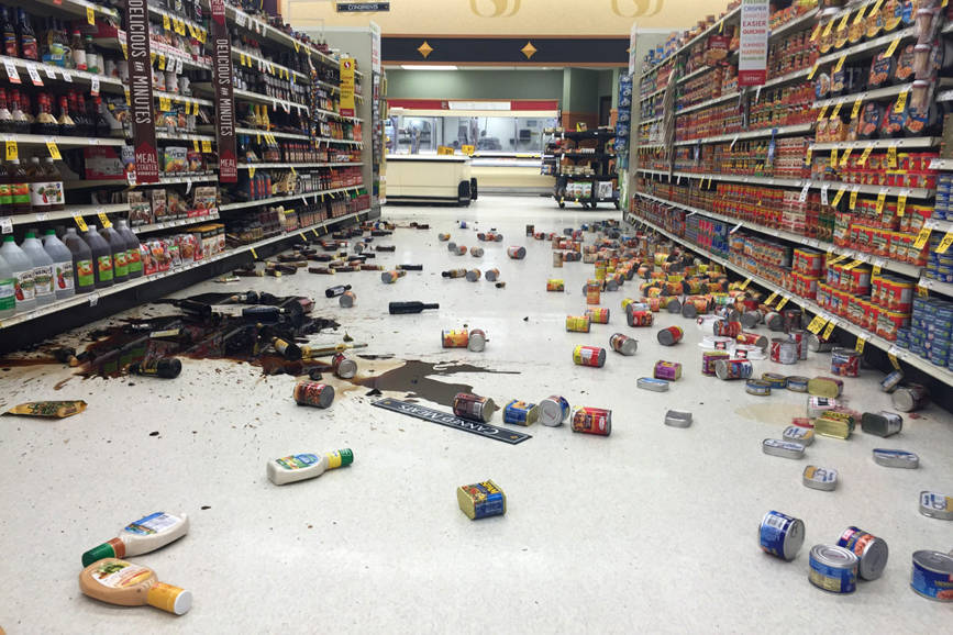 In this photo provided by Vincent Nusunginya, items fallen from the shelves litter the aisles inside a Safeway grocery store following a magnitude 6.8 earthquake on the Kenai Peninsula on Sunday Jan. 24, 2016, in south-central Alaska. The quake knocked items off shelves and walls in south-central Alaska and jolted the nerves of residents in this earthquake prone region, but there were no immediate reports of injuries. (Vincent Nusunginya via the AP)