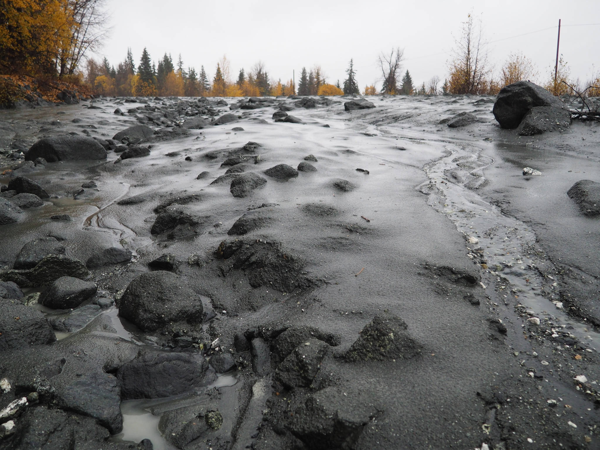 A mudslide covers the Haines Highway north of Klukwan on Sunday, Oct. 14, 2018 in this photo provided by the Alaska Department of Transportation and Public Facilities. The first significant storm of the fall brought heavy rain that triggered mudslides that blocked the highway for several hours. The highway reopened before Monday. (Lynette Campbell | Courtesy photo)