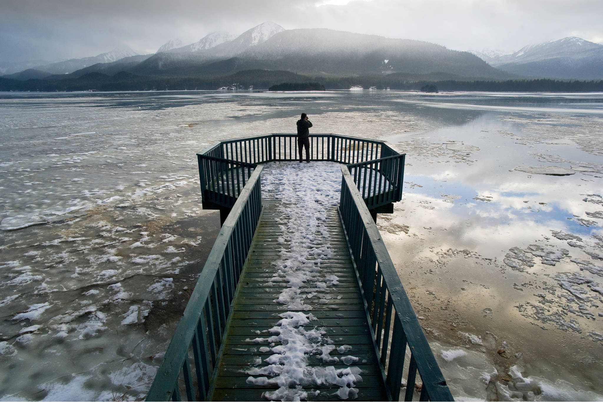 In this Empire file photo from 2012, Laurent Dick photographs the Mendenhall Wetlands State Game Refuge. A professor who studies coastal zone management will give a talk today at the University of Alaska Southeast. (Michael Penn | Juneau Empire)