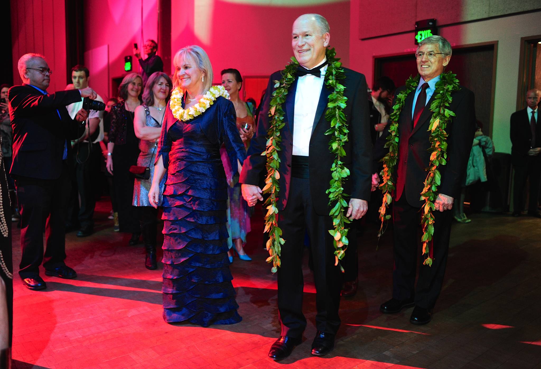 Gov. Bill Walker and his wife, Donna, walk into Centennial Hall’s Sheffield Ballroom with Lt. Gov. Byron Mallott, right, for the Inaugural Gala.