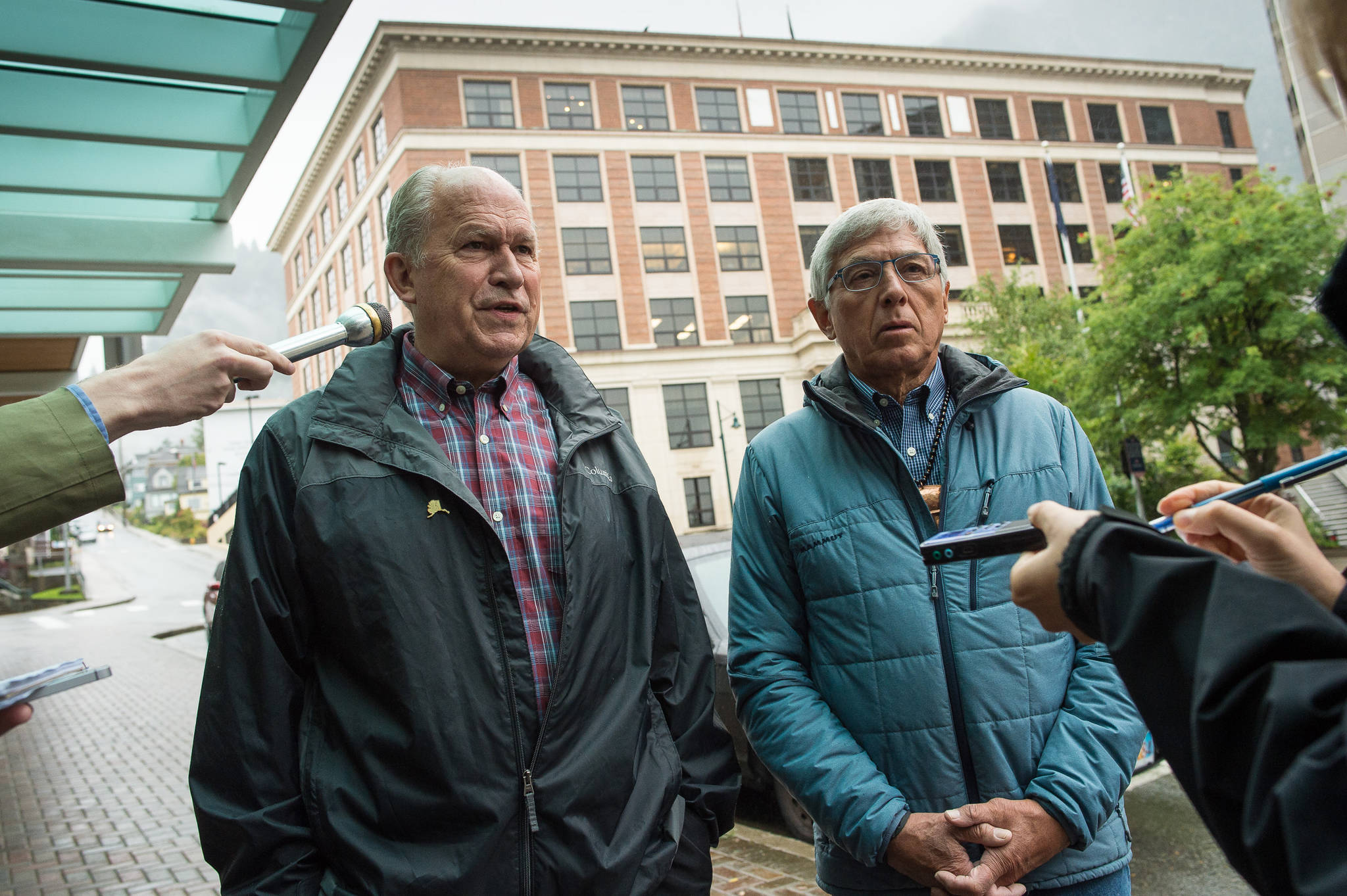 Gov. Bill Walker and Lt. Gov. Byron Mallott speak to the press after filing for re-election at the state’s election office in Juneau on Monday, Aug. 21, 2017.
