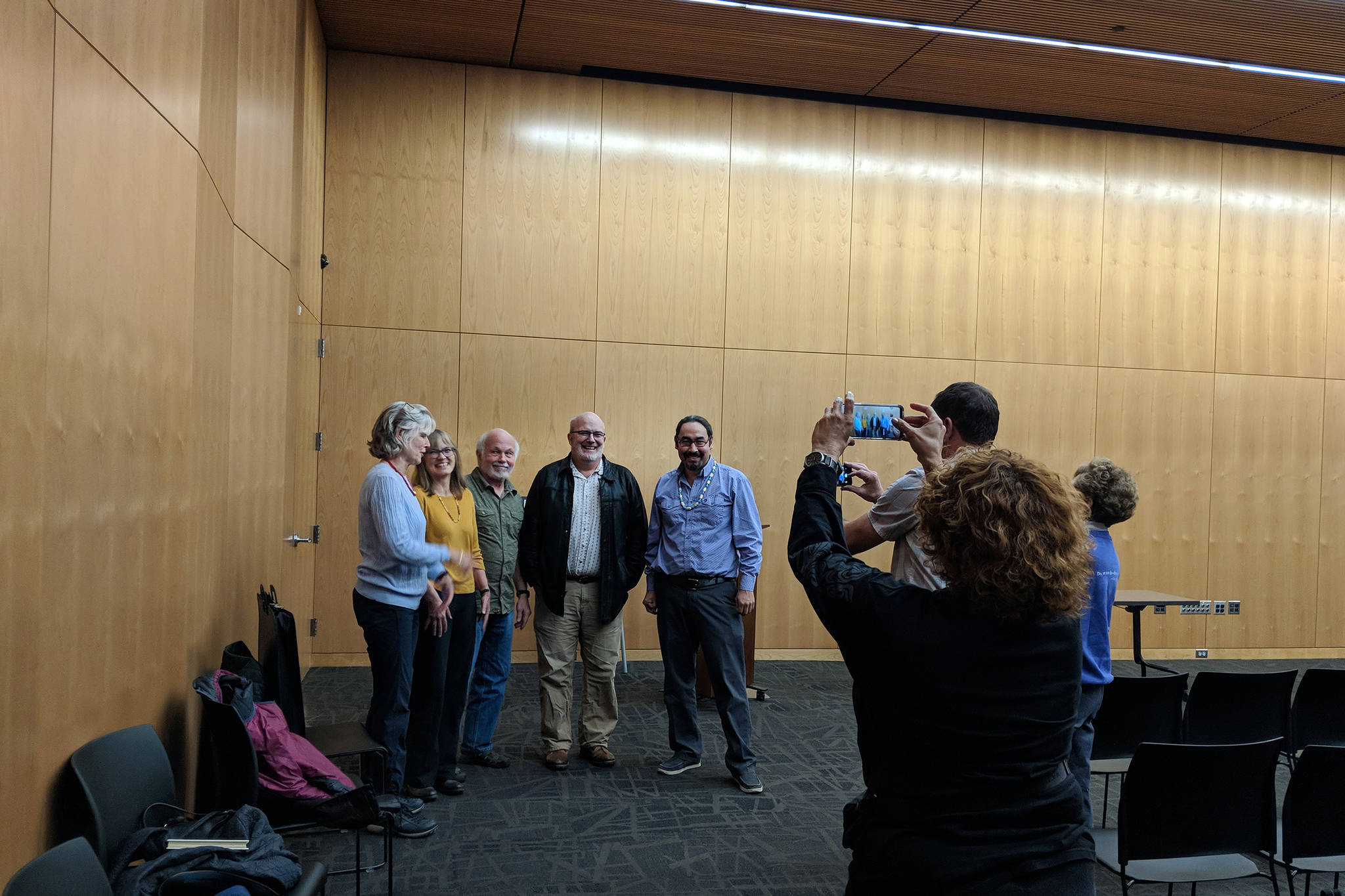 After each person read from their works and answered questions, Susi Gregg Fowler and illustrator Jim Fowler, Ishmael Hope, John Straley and Heather Lende posed for a group photo. Fans decided to capture the moment, too. (Ben Hohenstatt | Capital City Weekly)