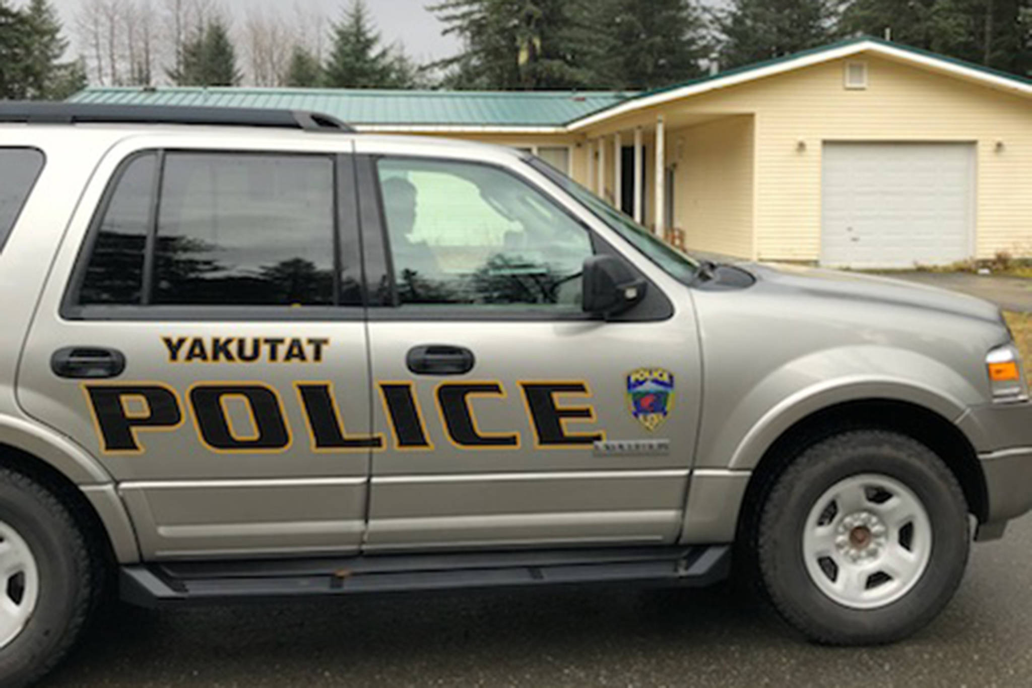A Yakutat Borough Police Department vehicle sits in front of the site of a fatal stabbing in Yakutat on Sunday, Oct. 14, 2018. (Courtesy Photo | Yakutat Borough Police Department)