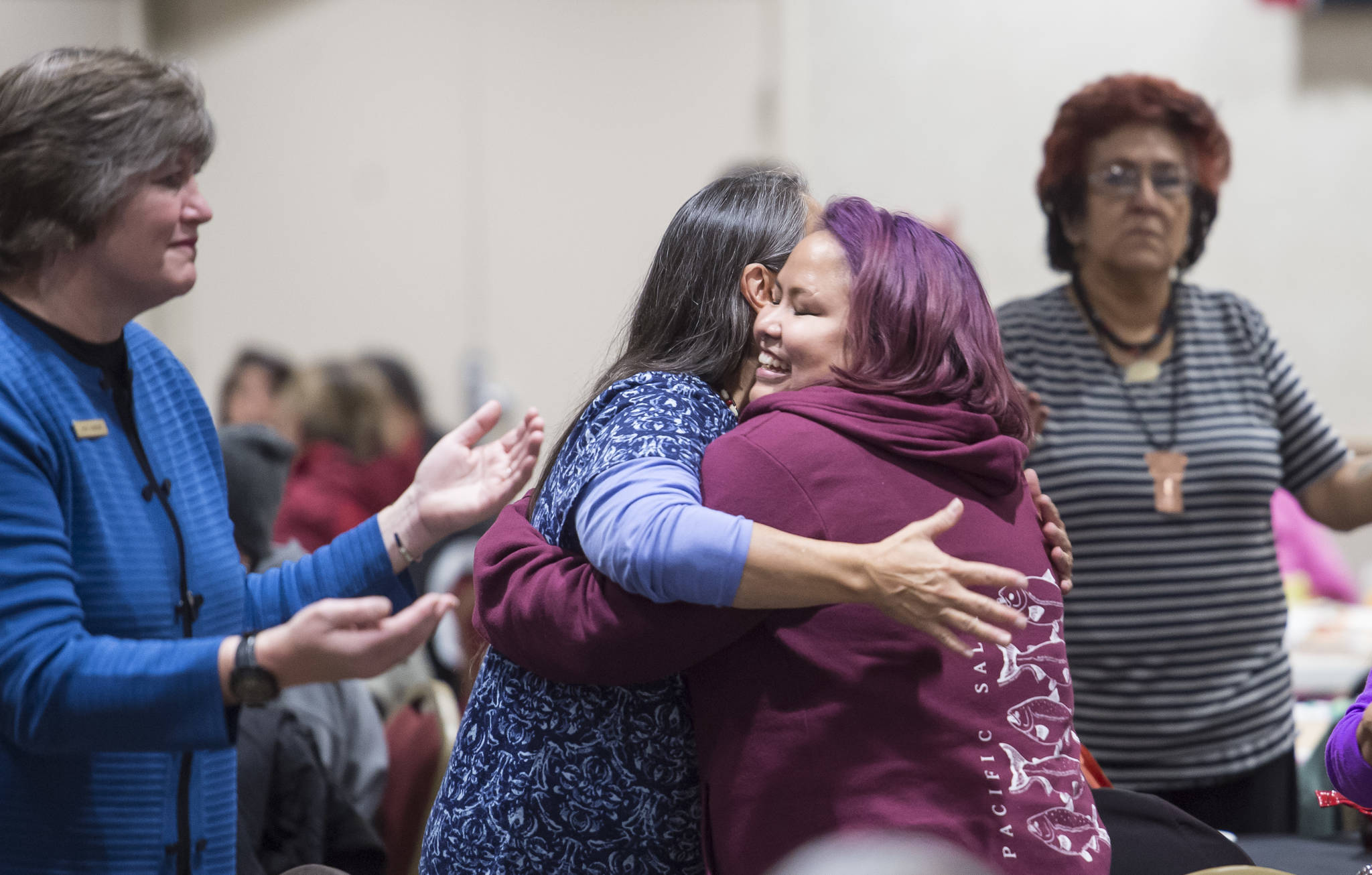 People attend a Celebrate Survivors gathering sponsored by Central Council Tlingit and Haida Indian Tribes of Alaska and AWARE in the Elizabeth Peratrovich Hall on Tuesday, Oct. 23, 2018. October is Domestic Violence Awareness Month. (Michael Penn | Juneau Empire)