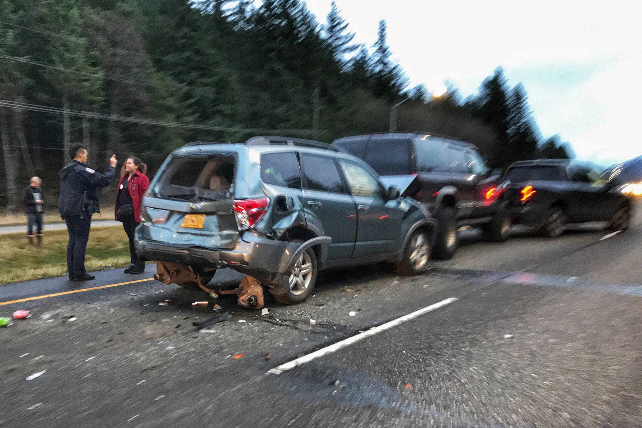 Juneau Police Department Officer C.J. Warnaca administers a field sobriety test after a four-car crash on Egan Drive on Wednesday, Oct. 24, 2018. Nobody was harmed, authorities said on scene. (Michael Penn | Juneau Empire)