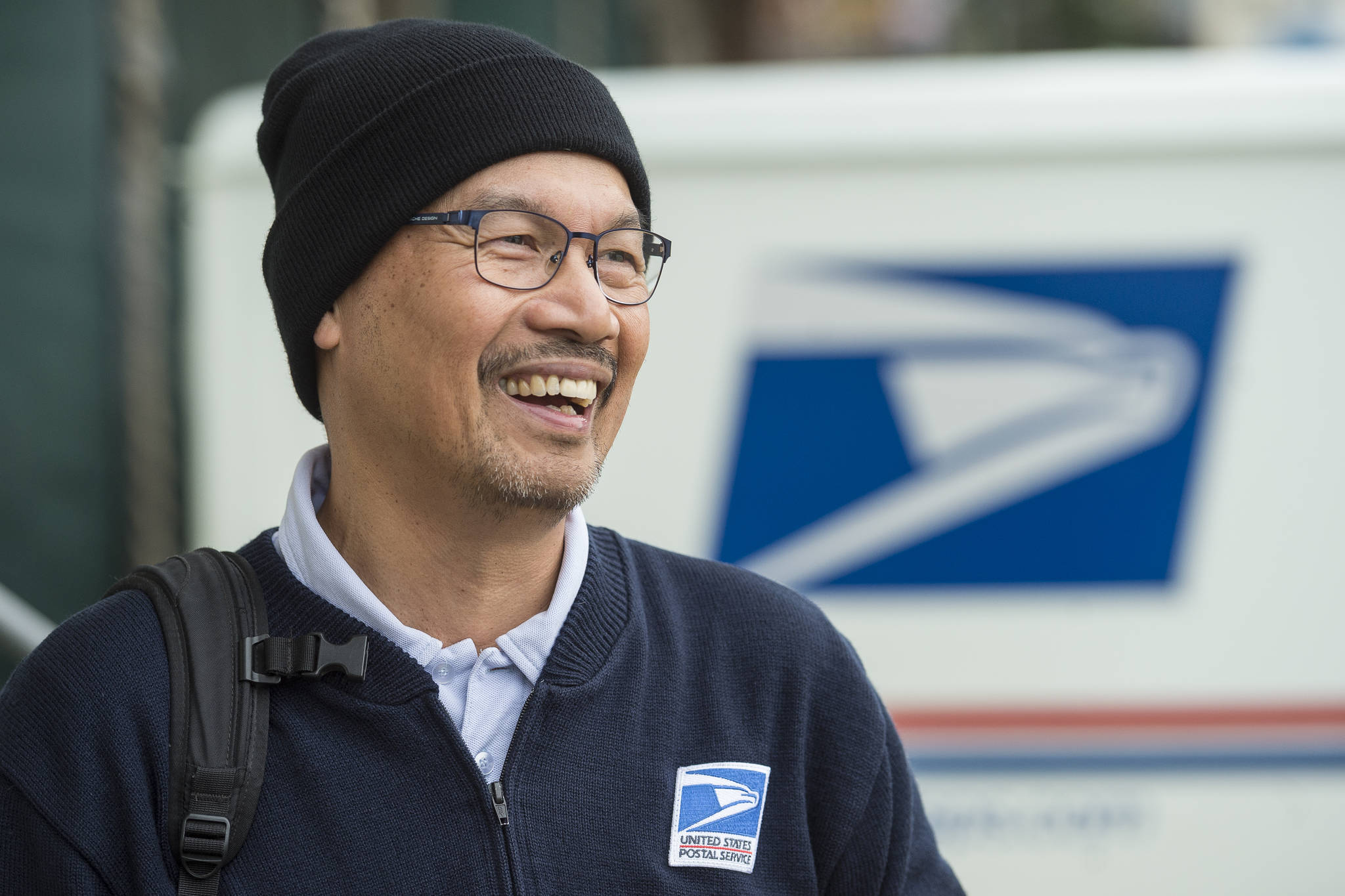 Conrado Ebron, 62, talks about working for the United States Postal Service on Tuesday, Oct. 23, 2018. Ebron is retiring as a postal carrier, mostly on the downtown route, after 33 years. (Michael Penn | Juneau Empire)
