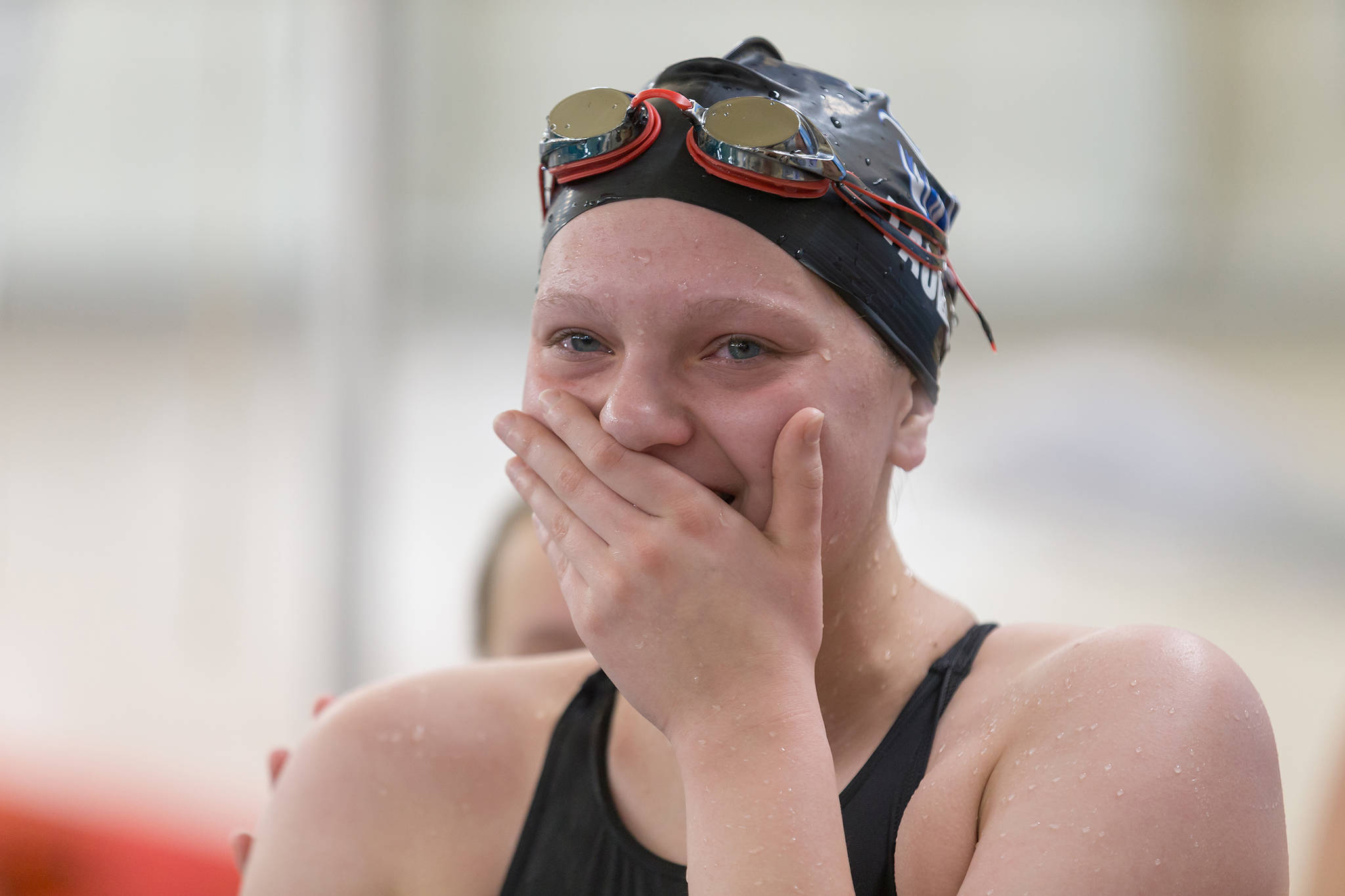 Thunder Mountain’s Hannah Taube reacts after setting a new lifetime best time in the 500-yard freestyle event. (Courtesy Photo | Phil Loseby)