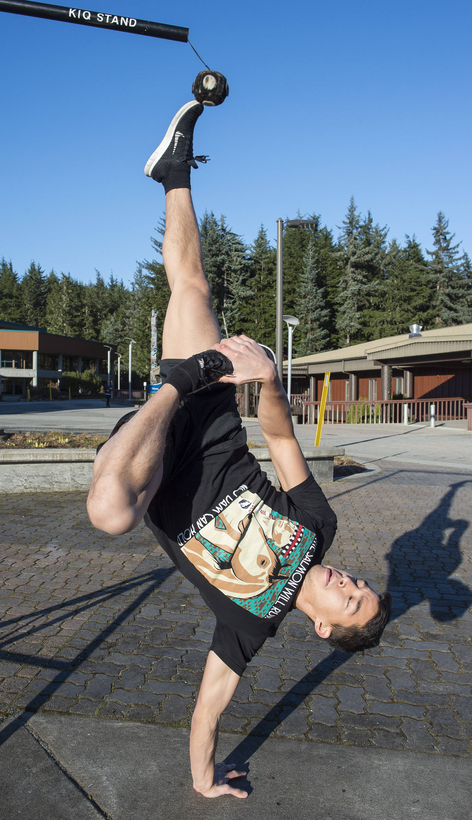 Kyle Worl demonstrates the Alaskan high kick while at the University of Alaska Southeast campus on Tuesday, Nov. 7, 2017. The annual games will be part of Native American and Native Alaskan Heritage month. (Michael Penn | Juneau Empire File)