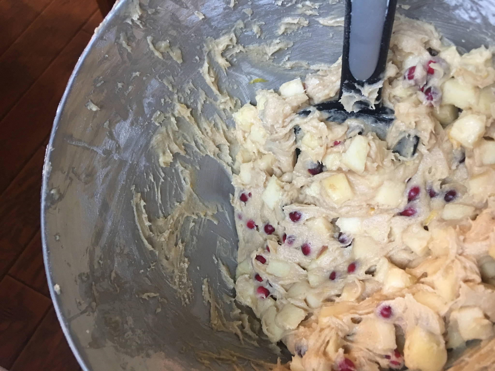 Erin Anais Heist mixes bog cranberries (Vaccinium oxycoccos) with apples, butter and sugar for a loaf of bread in her kitchen on Oct. 14, 2018. (Erin Anais Heist | For the Juneau Empire)