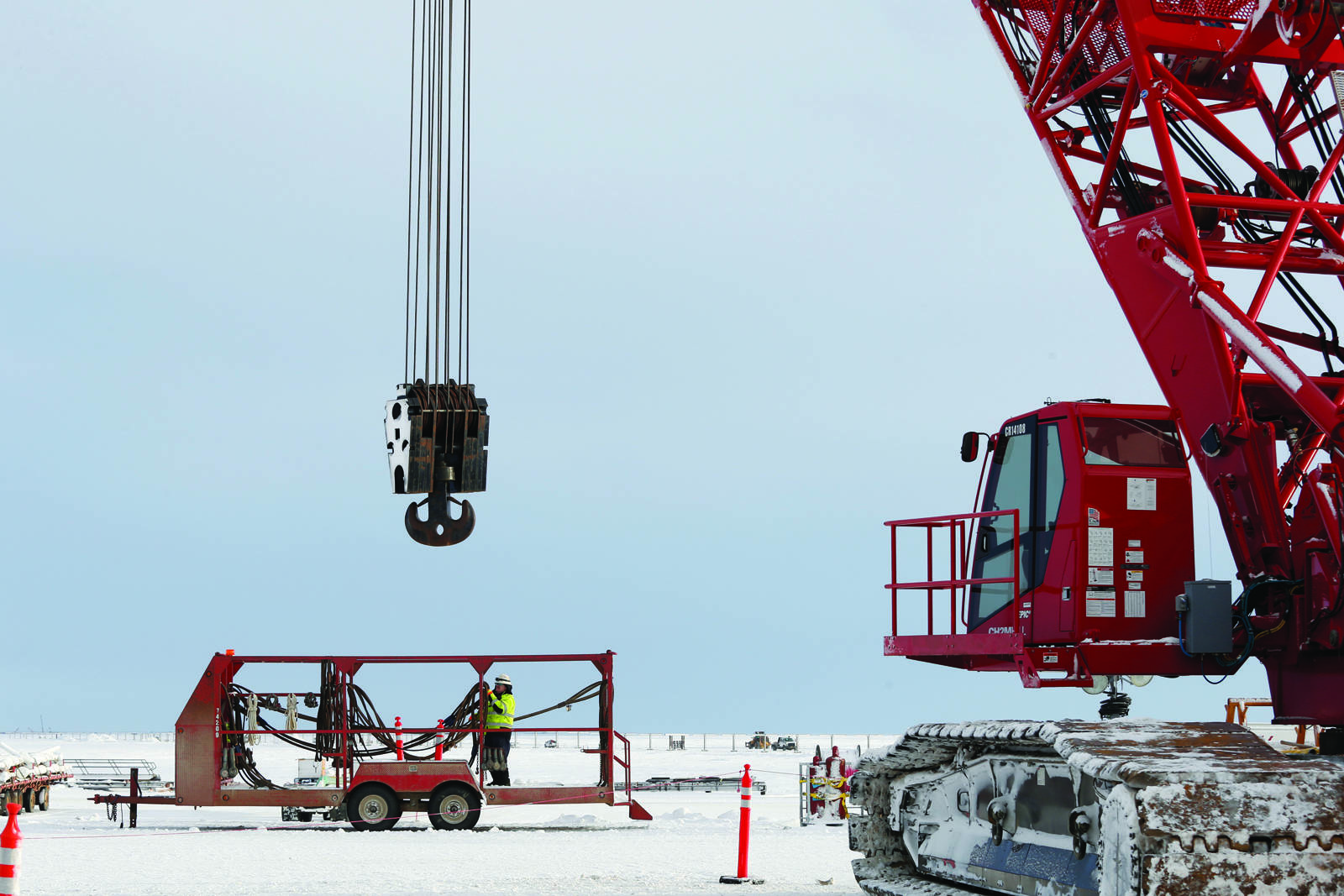 A crane stands by for module and facility installation on the ConocoPhillips GMT-1 drilling pad. First oil from the project flowed on Oct. 5, and royalty revenue from the project could mean hundreds of millions in new funding for affected North Slope communities. (Courtesy Photo | Judy Patrick, ConocoPhillips)