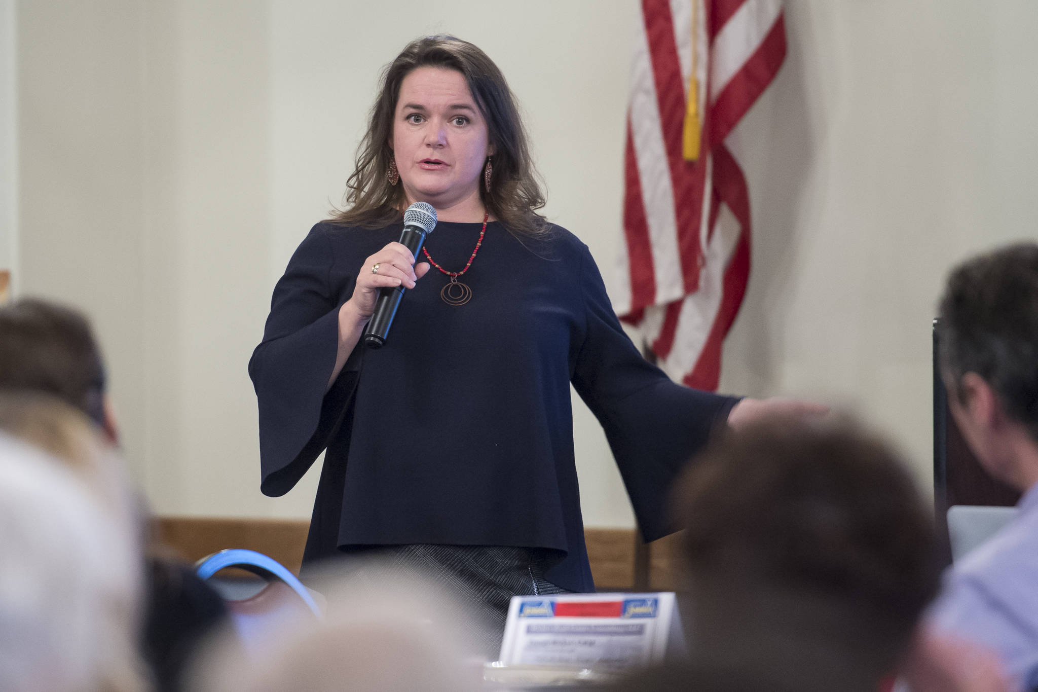 Meilani Schijvens, Director of Rain Coast Data, speaks to the Juneau Chamber of Commerce about Juneau ecomony at the Moose Lodge on Thursday, Nov. 1, 2018. (Michael Penn | Juneau Empire)