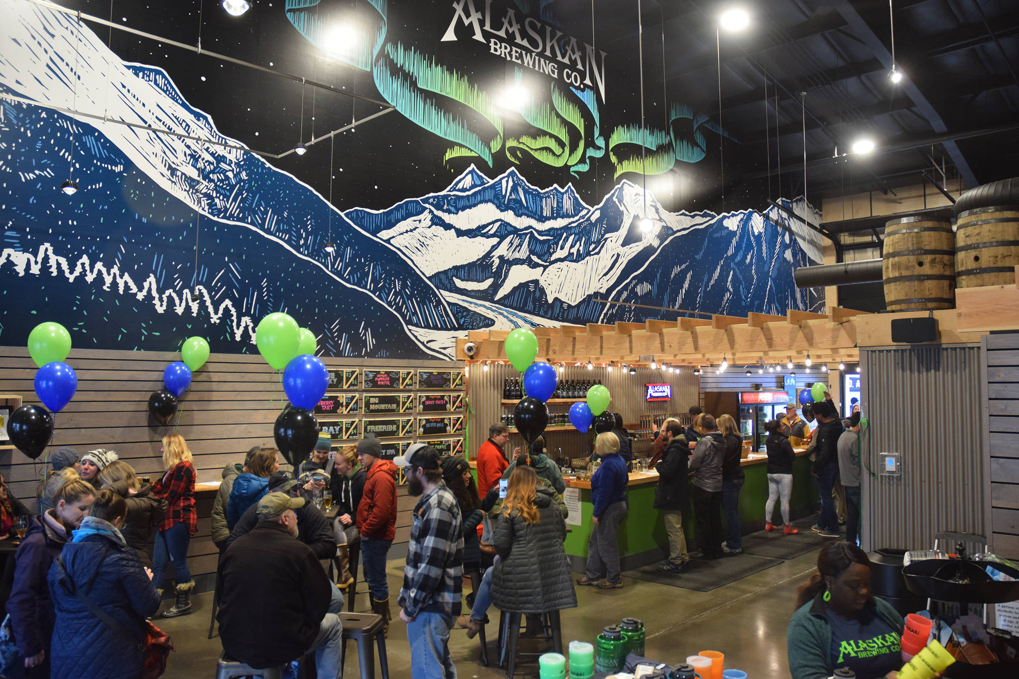 Beer lovers gather at the grand opening of Alaskan Brewing Co.’s new tasting room on Commercial Boulevard, Saturday, Nov. 3, 2018. (Kevin Gullufsen | Juneau Empire)