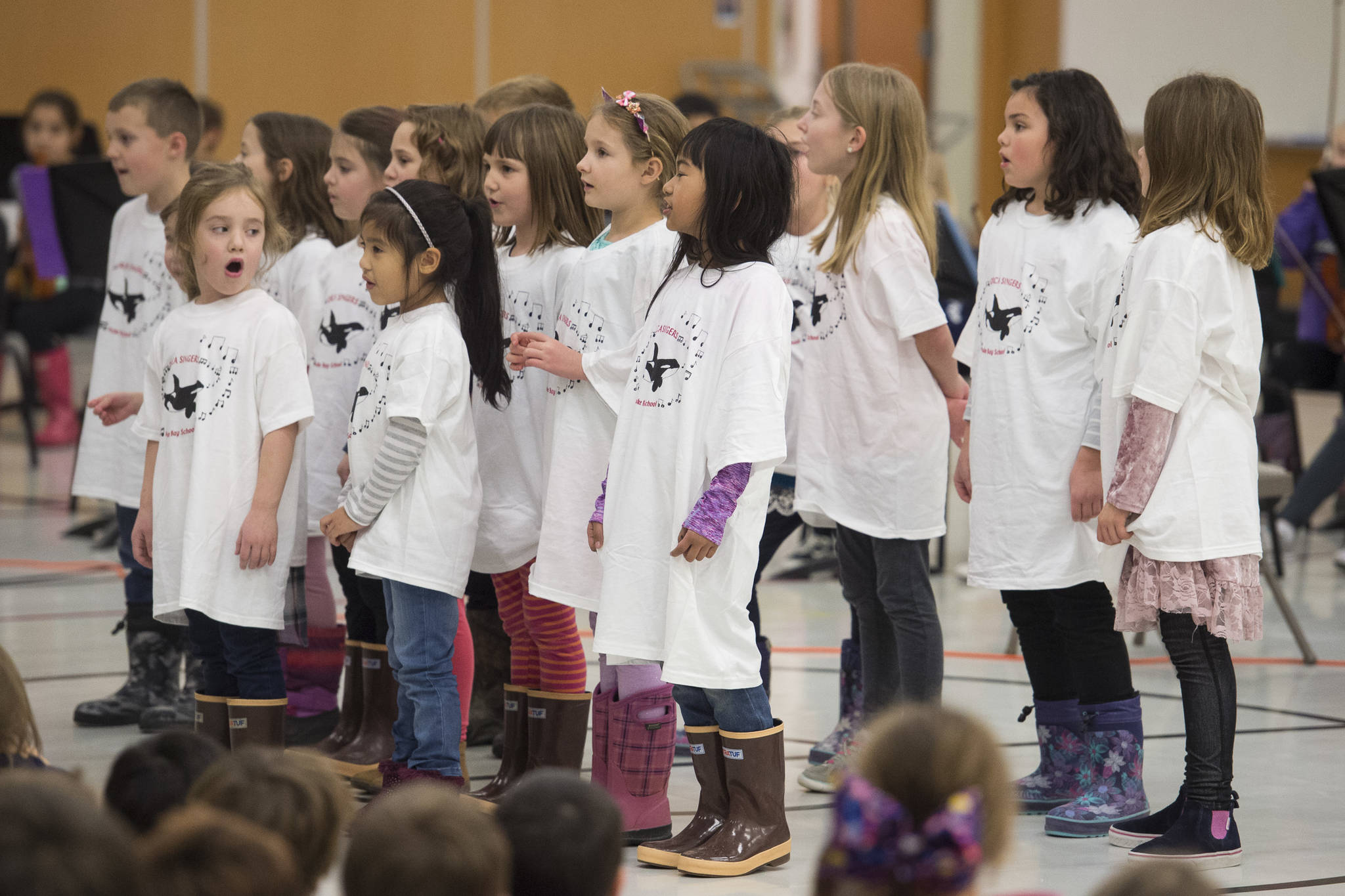 The Orca Singers sing during an assembly celebrating the 50th anniversary of Auke Bay Elementary School on Friday, Nov. 9, 2018. (Michael Penn | Juneau Empire)